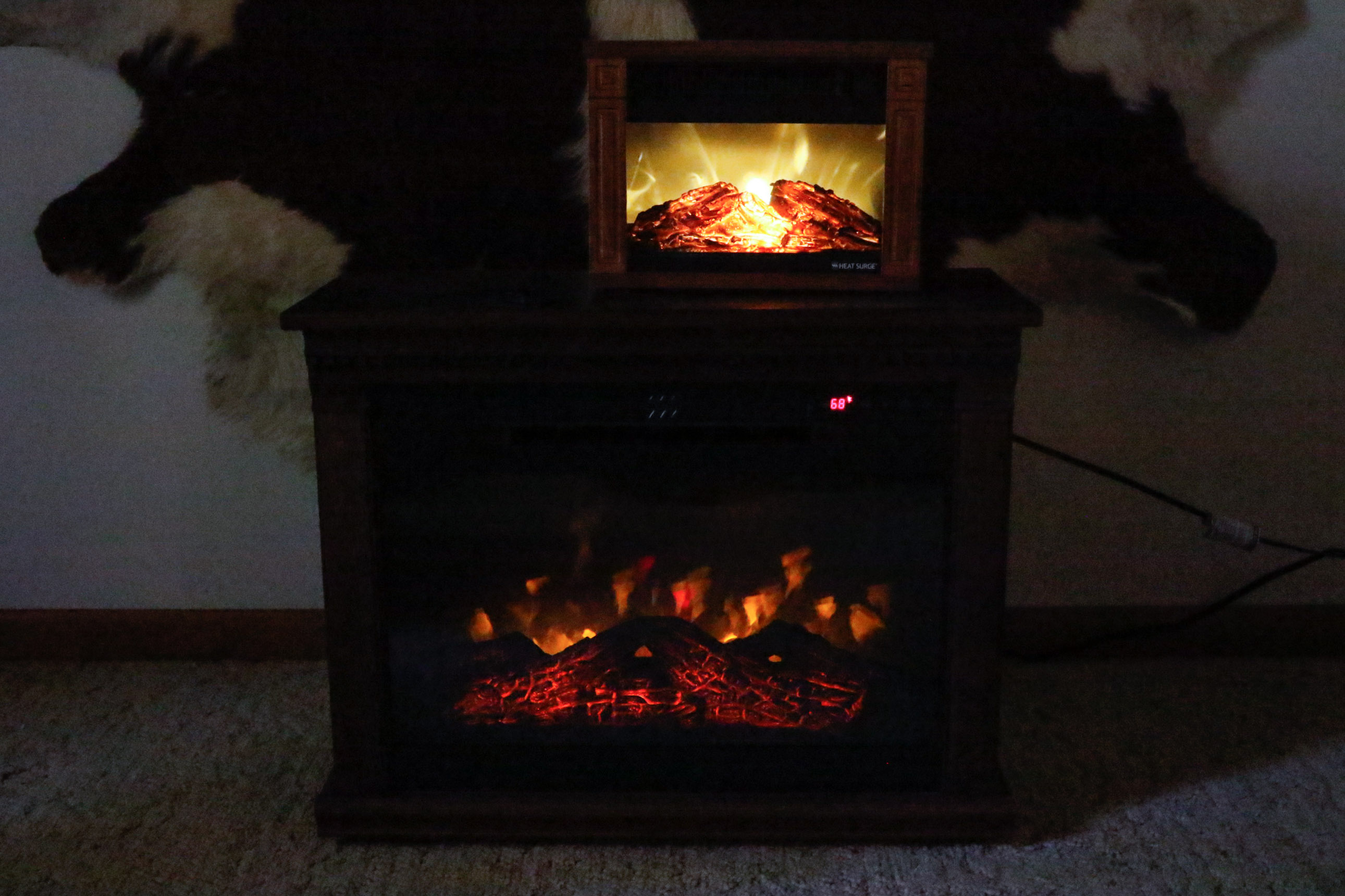 Two Heat Surge Electric Fireplace Units
