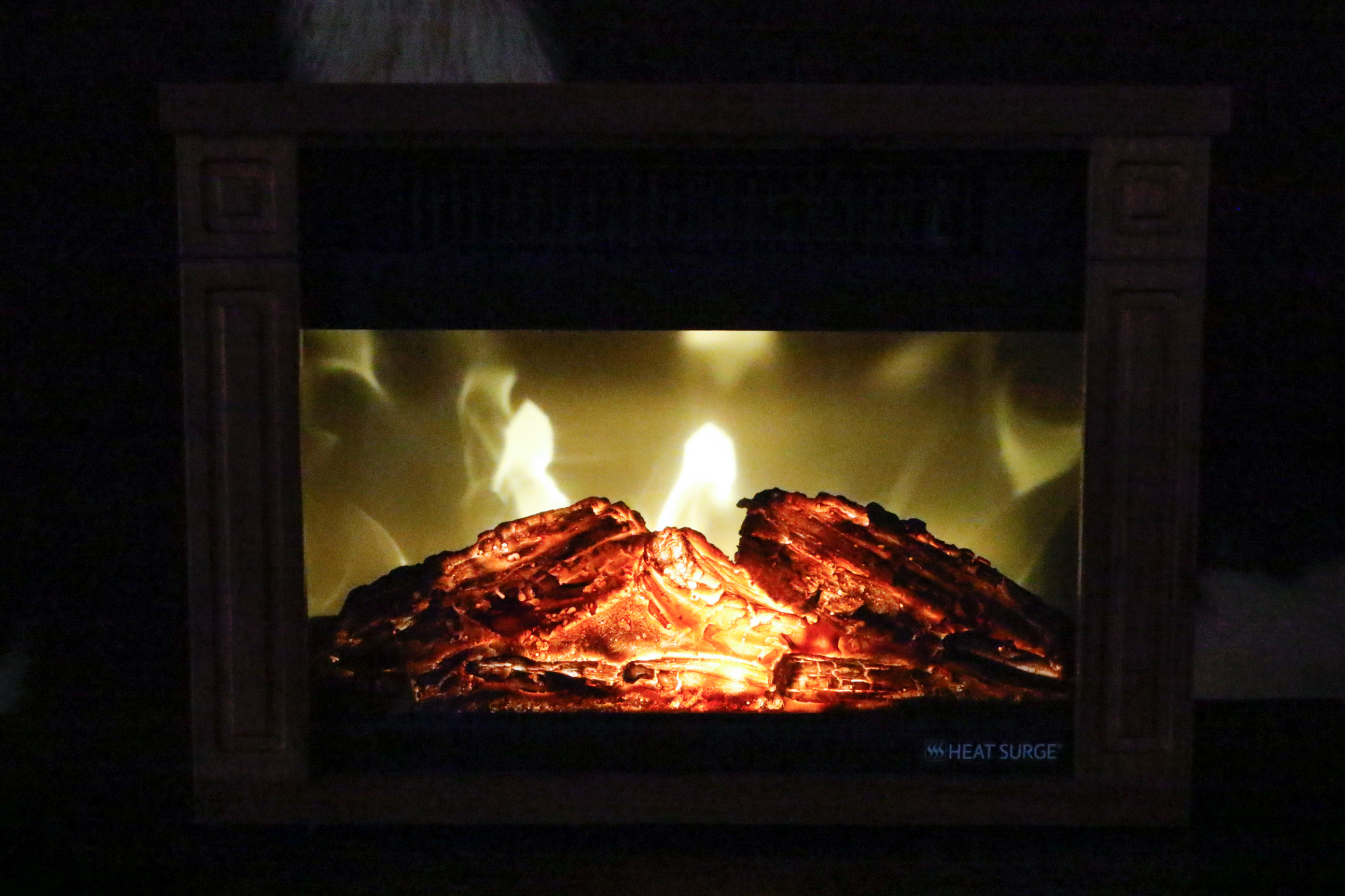 Two Heat Surge Electric Fireplace Units