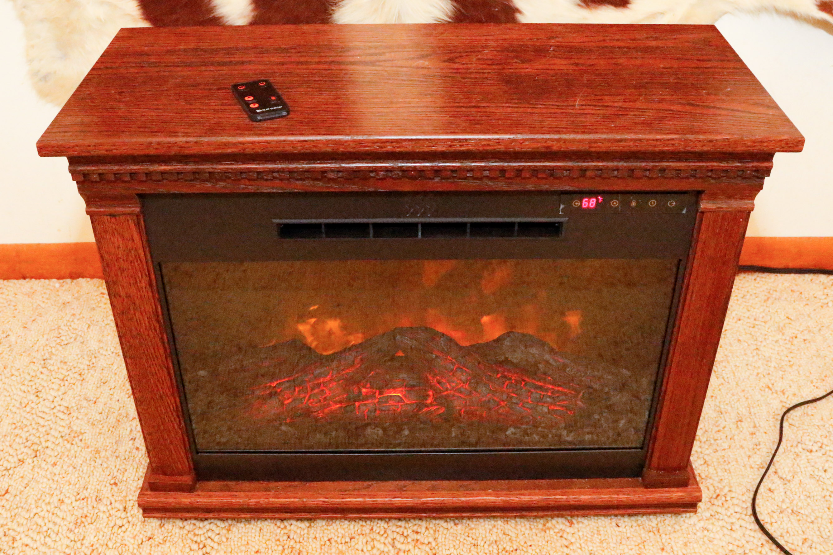 Two Heat Surge Electric Fireplace Units