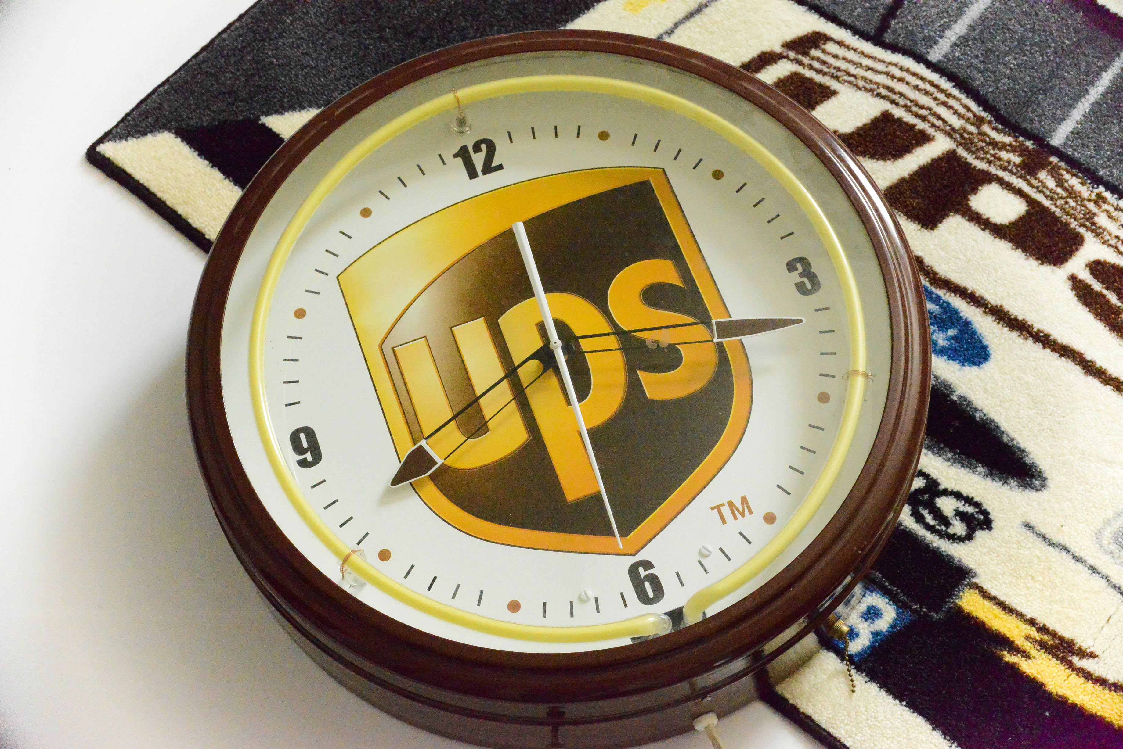 Neon UPS Clock and Dale Jarrett Nascar Rug