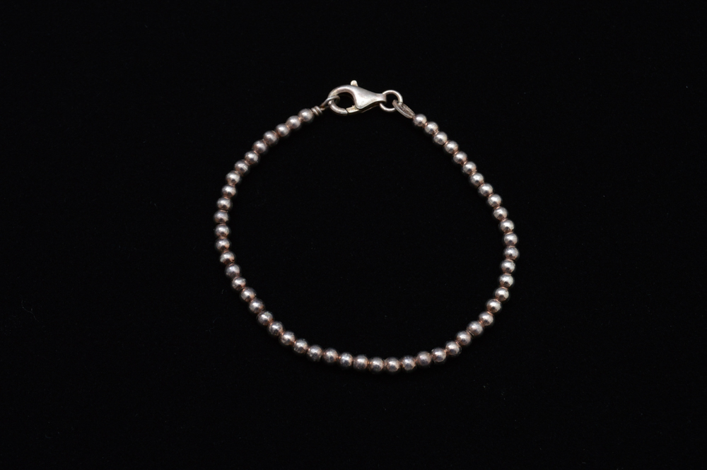 Three Sterling Silver Children's Bracelets and Four Pendants