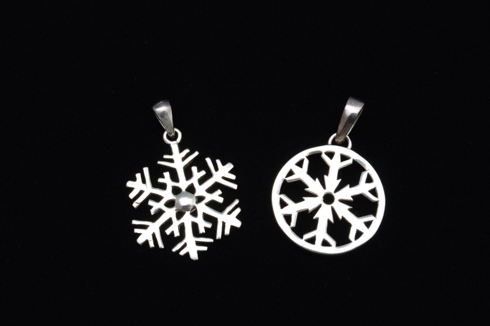 Three Sterling Silver Children's Bracelets and Four Pendants