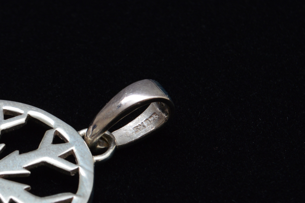 Three Sterling Silver Children's Bracelets and Four Pendants