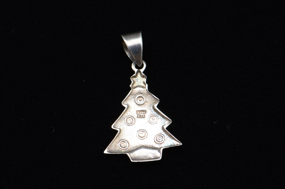 Three Sterling Silver Children's Bracelets and Four Pendants