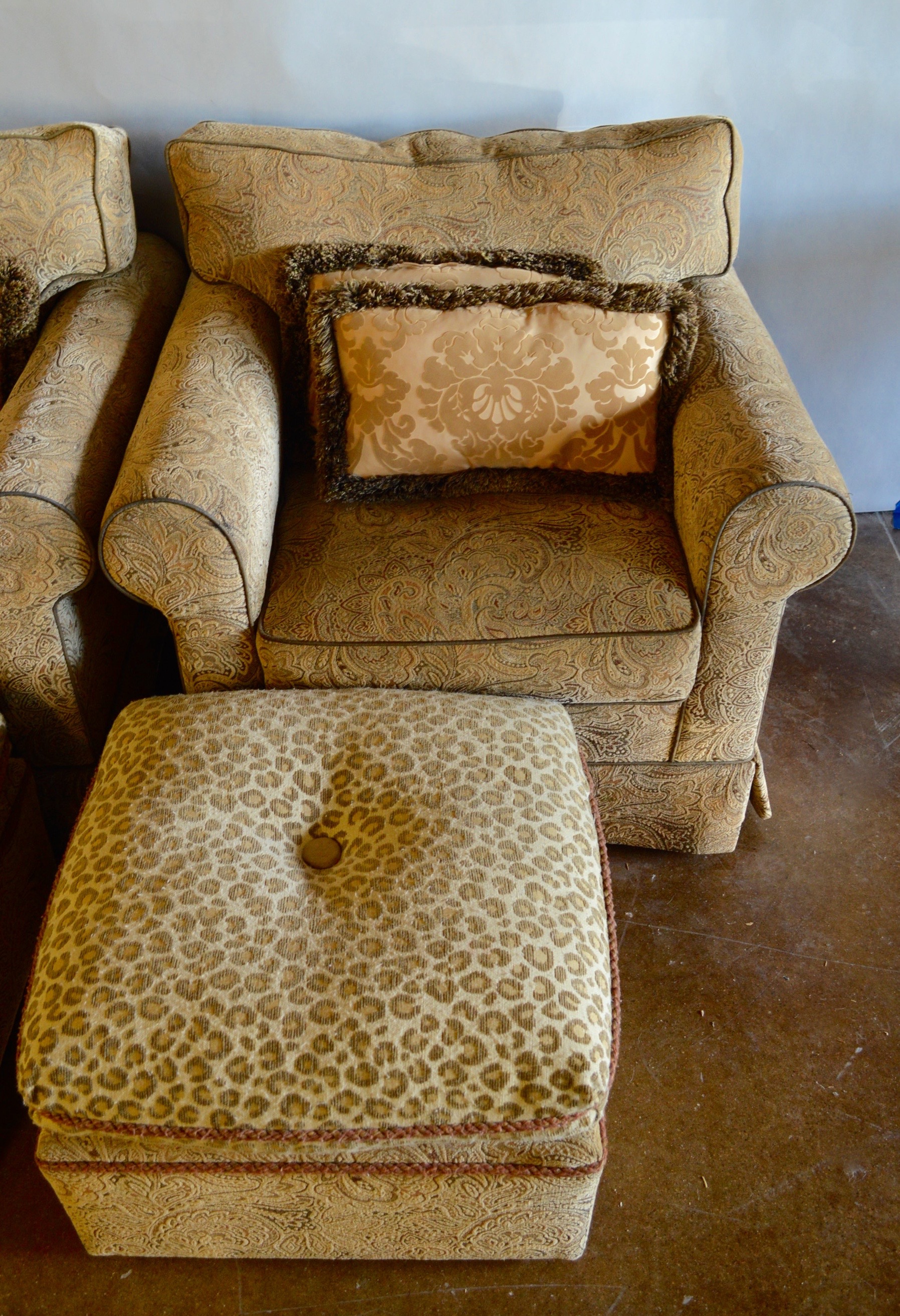 Two Overstuffed Armchairs with Ottomans