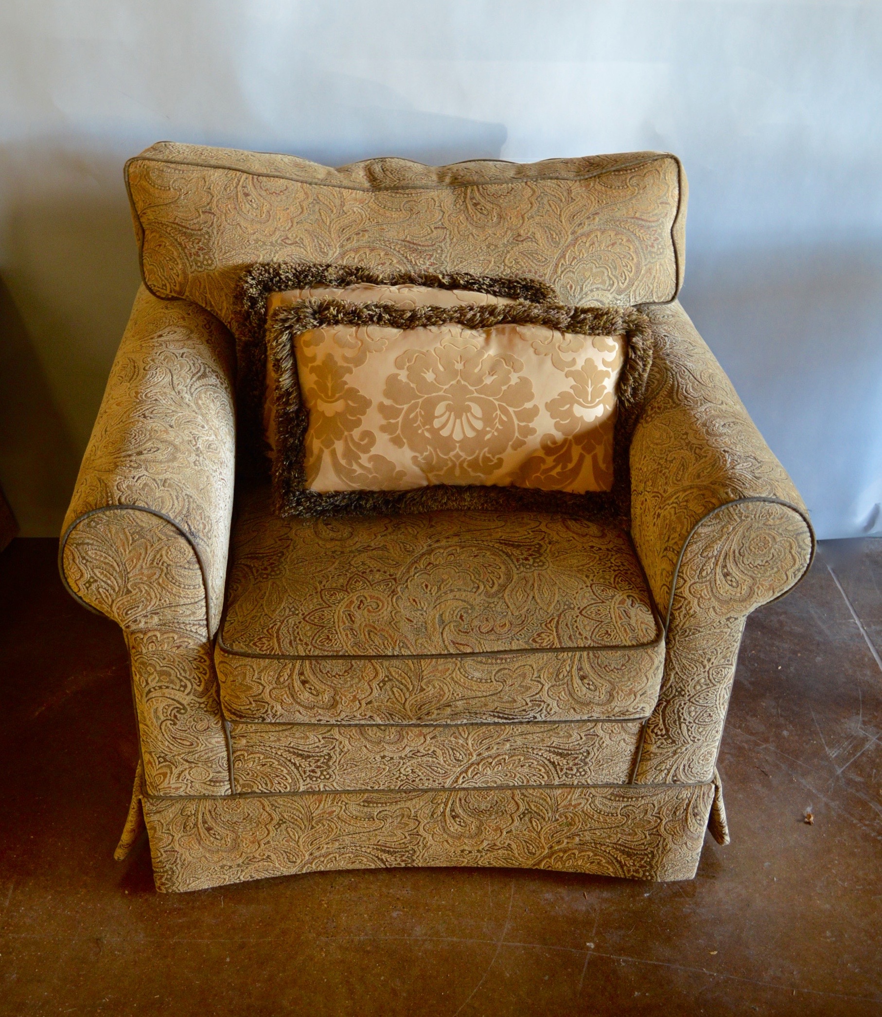 Two Overstuffed Armchairs with Ottomans