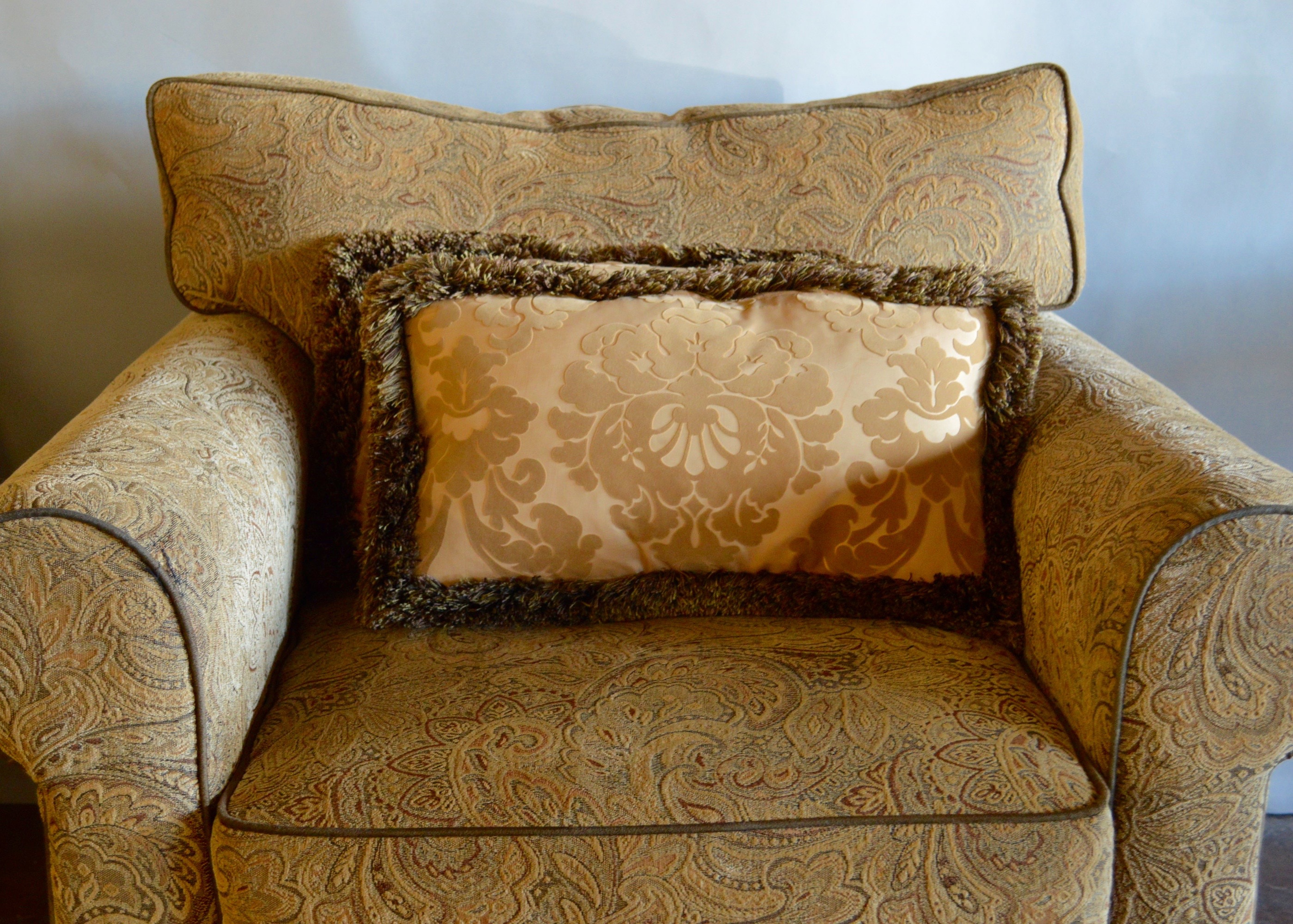 Two Overstuffed Armchairs with Ottomans