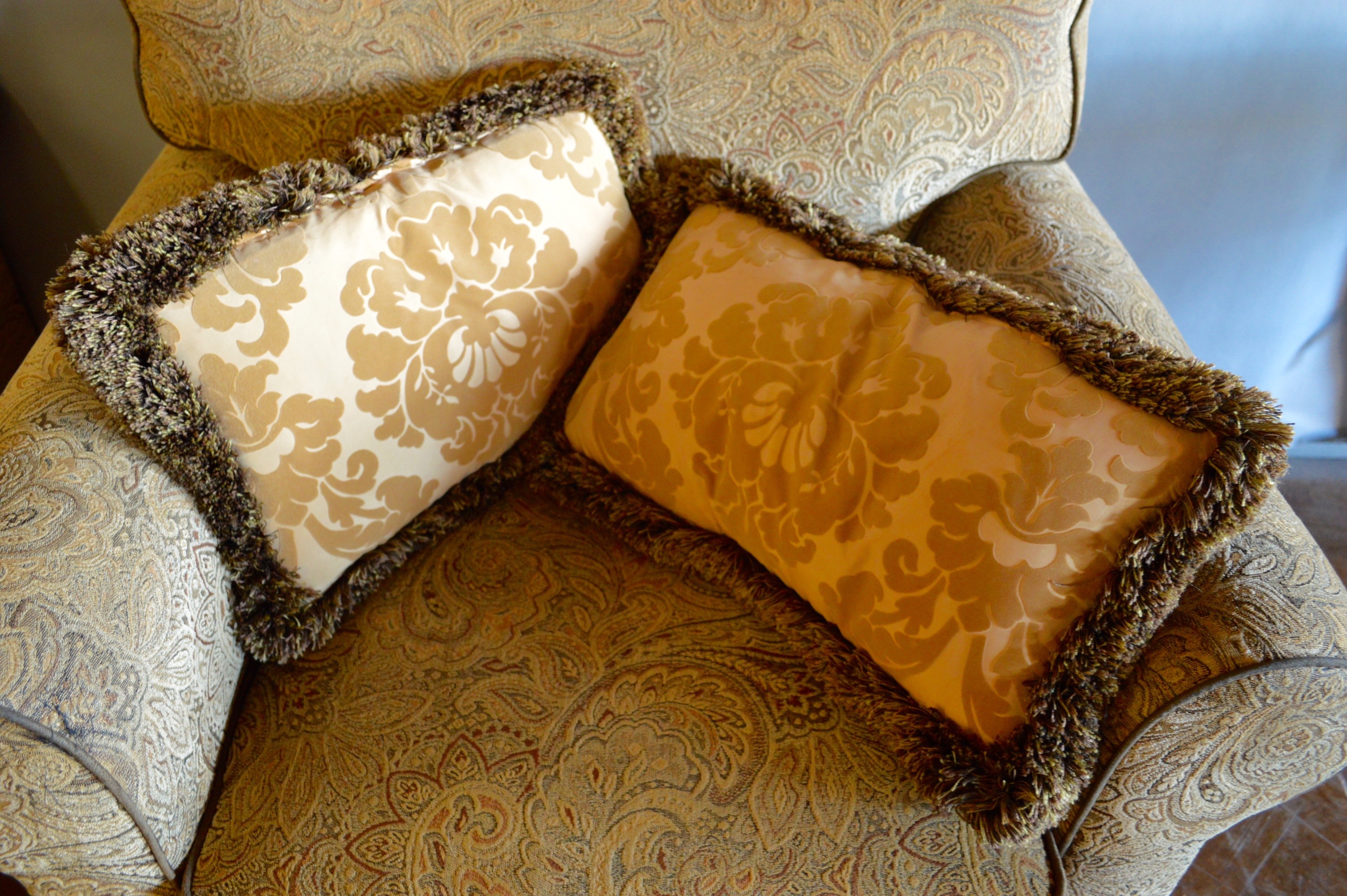 Two Overstuffed Armchairs with Ottomans