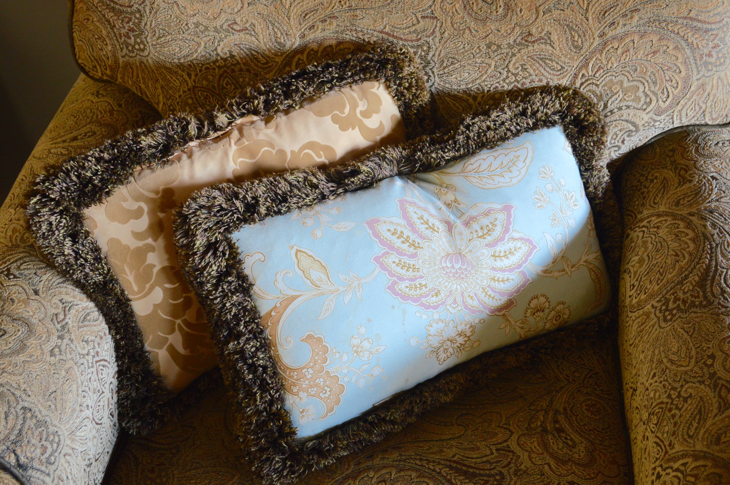 Two Overstuffed Armchairs with Ottomans