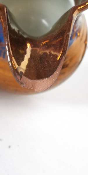 Two Antique Copper Luster Pitchers