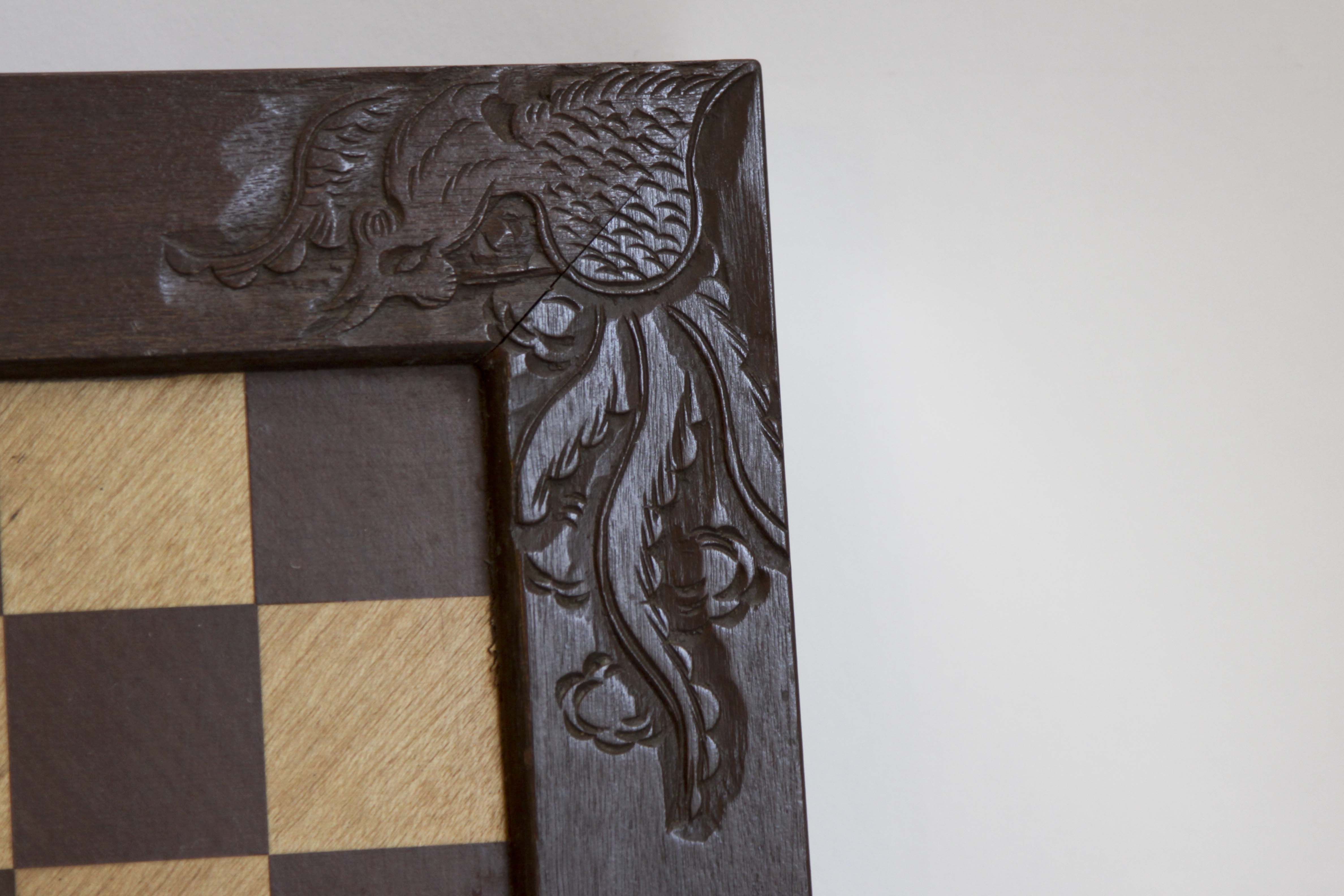 A Vintage Carved Asian-Theme Chess Set