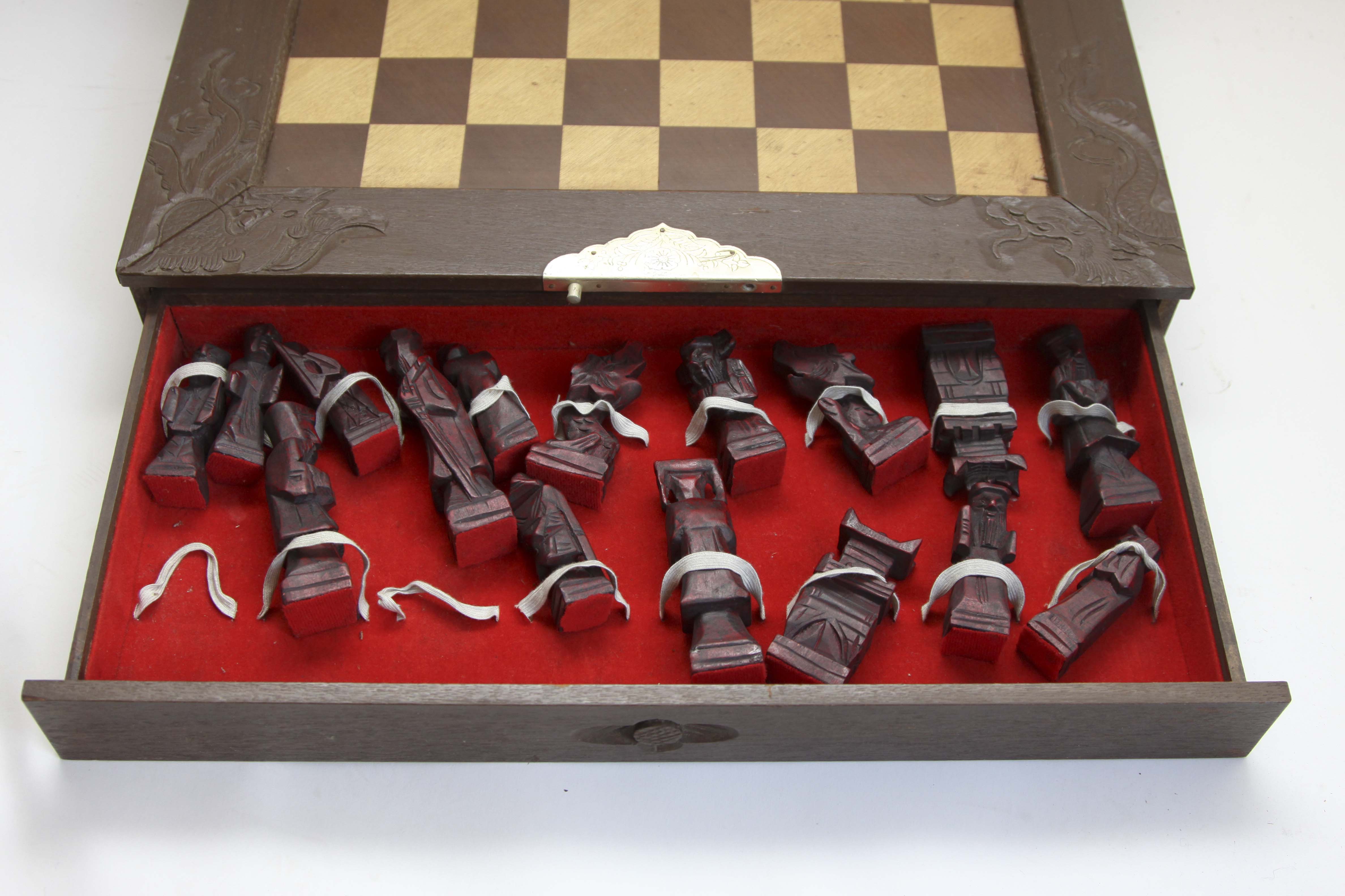 A Vintage Carved Asian-Theme Chess Set