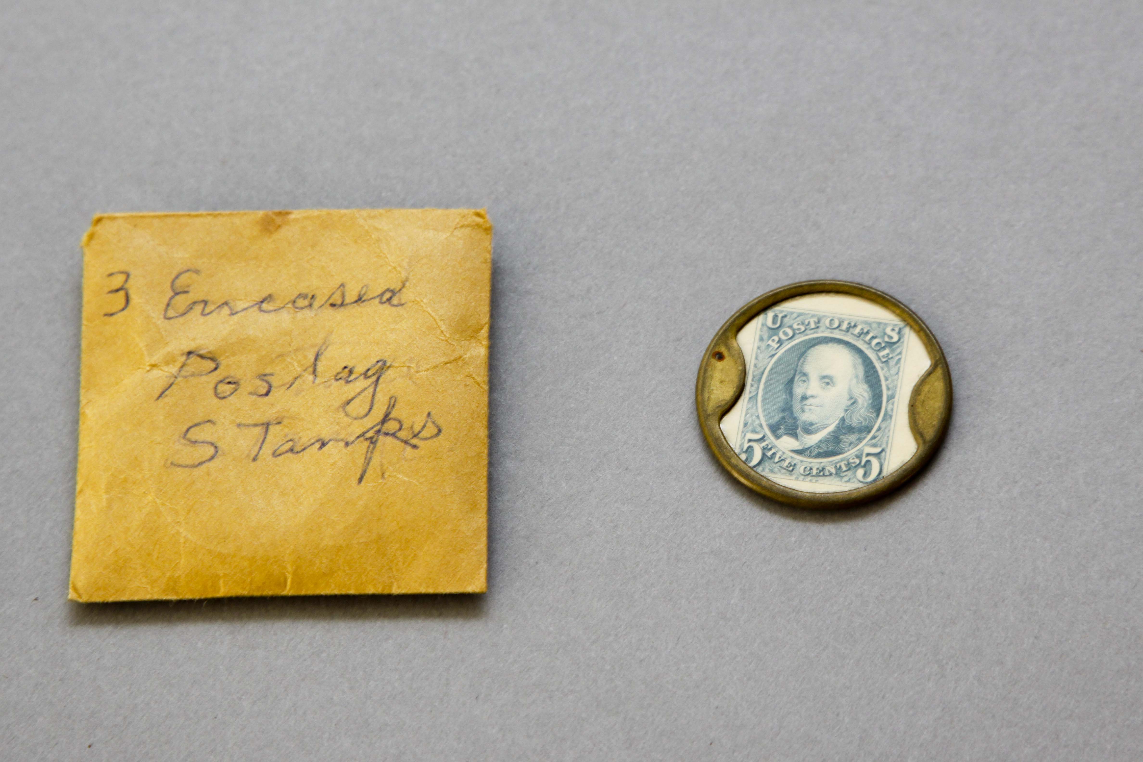 Encased Five Cent Ben Franklin Postage Stamp