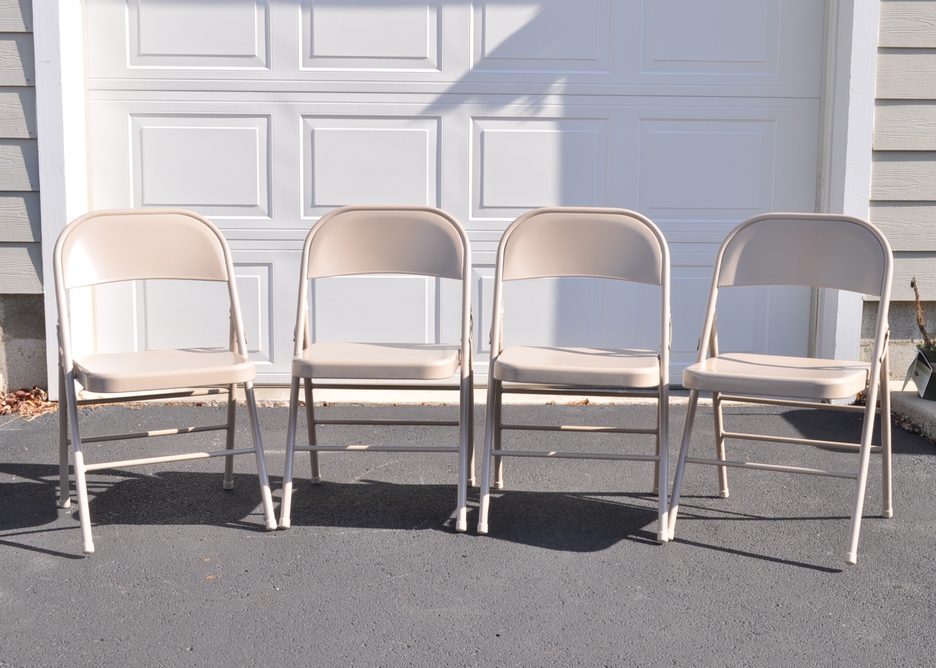 Four Folding Chairs