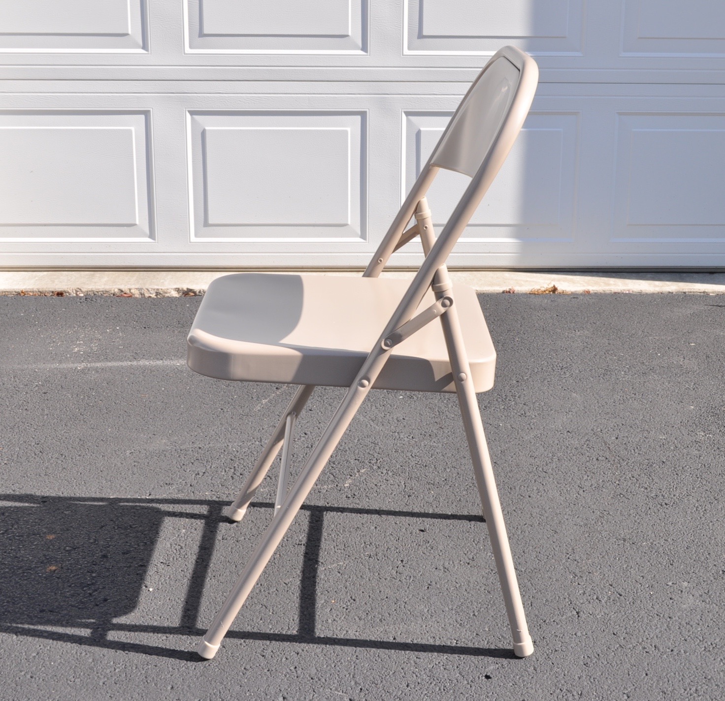 Four Folding Chairs