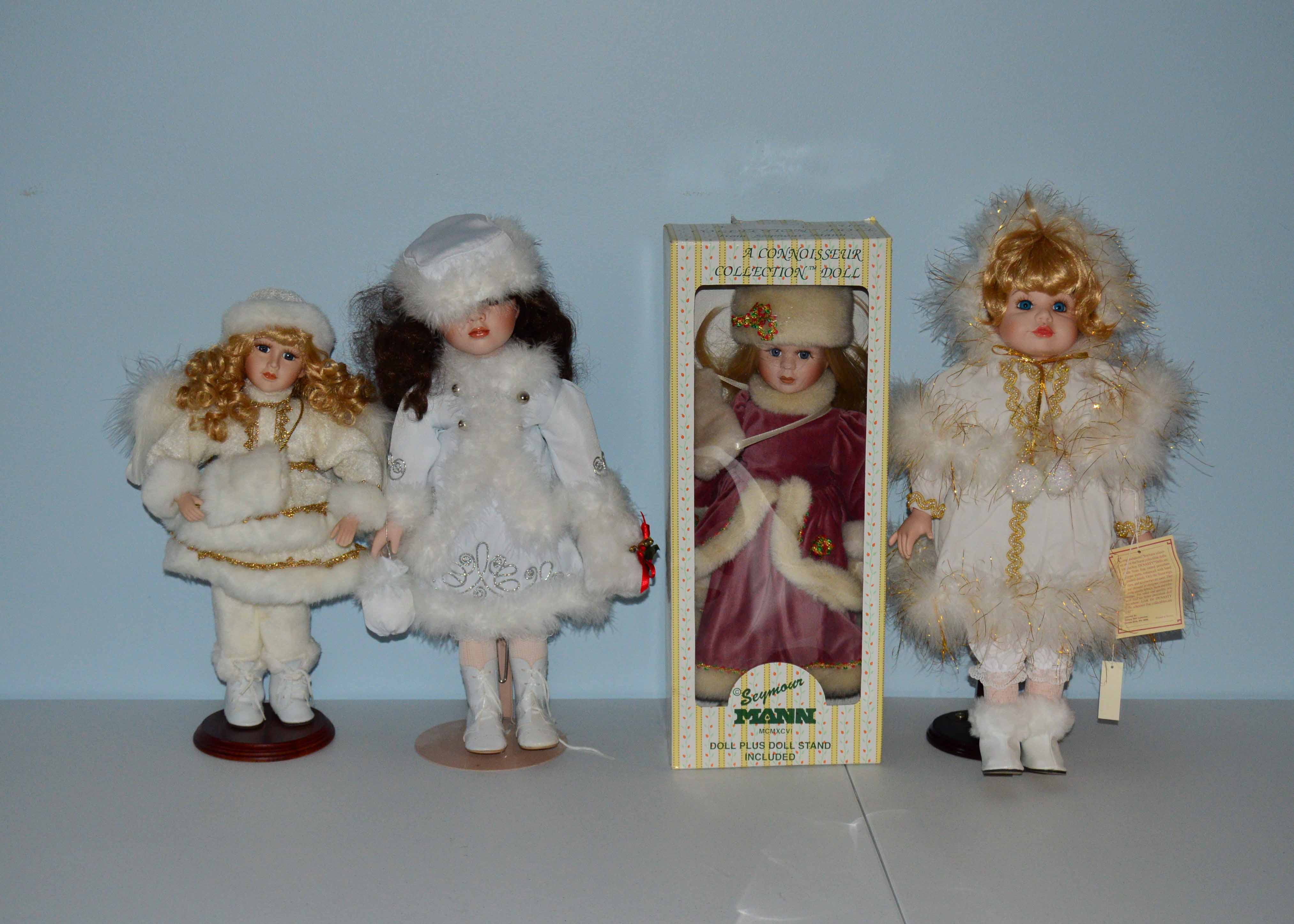 Collection of Winter Themed Porcelain Dolls