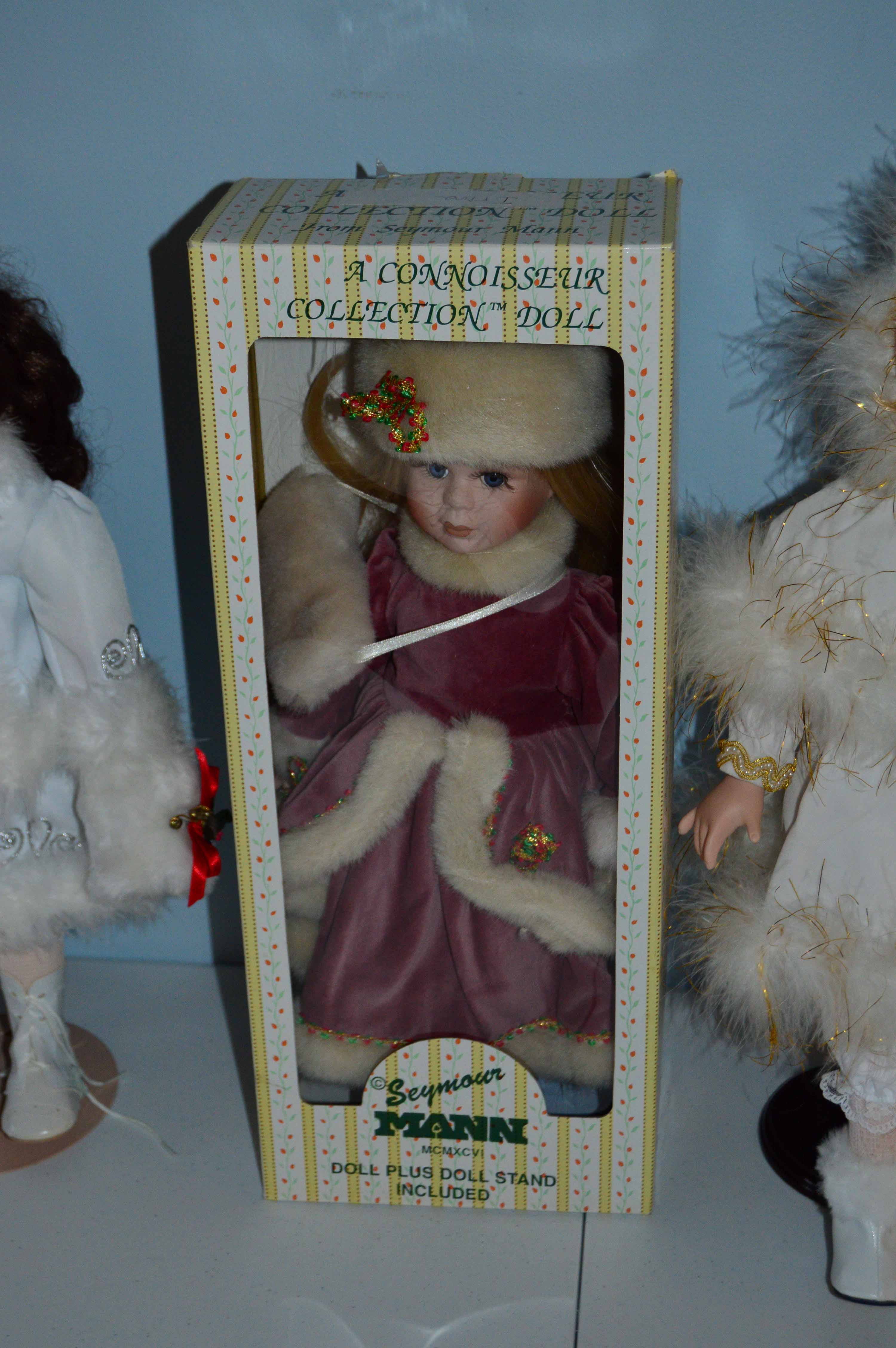 Collection of Winter Themed Porcelain Dolls