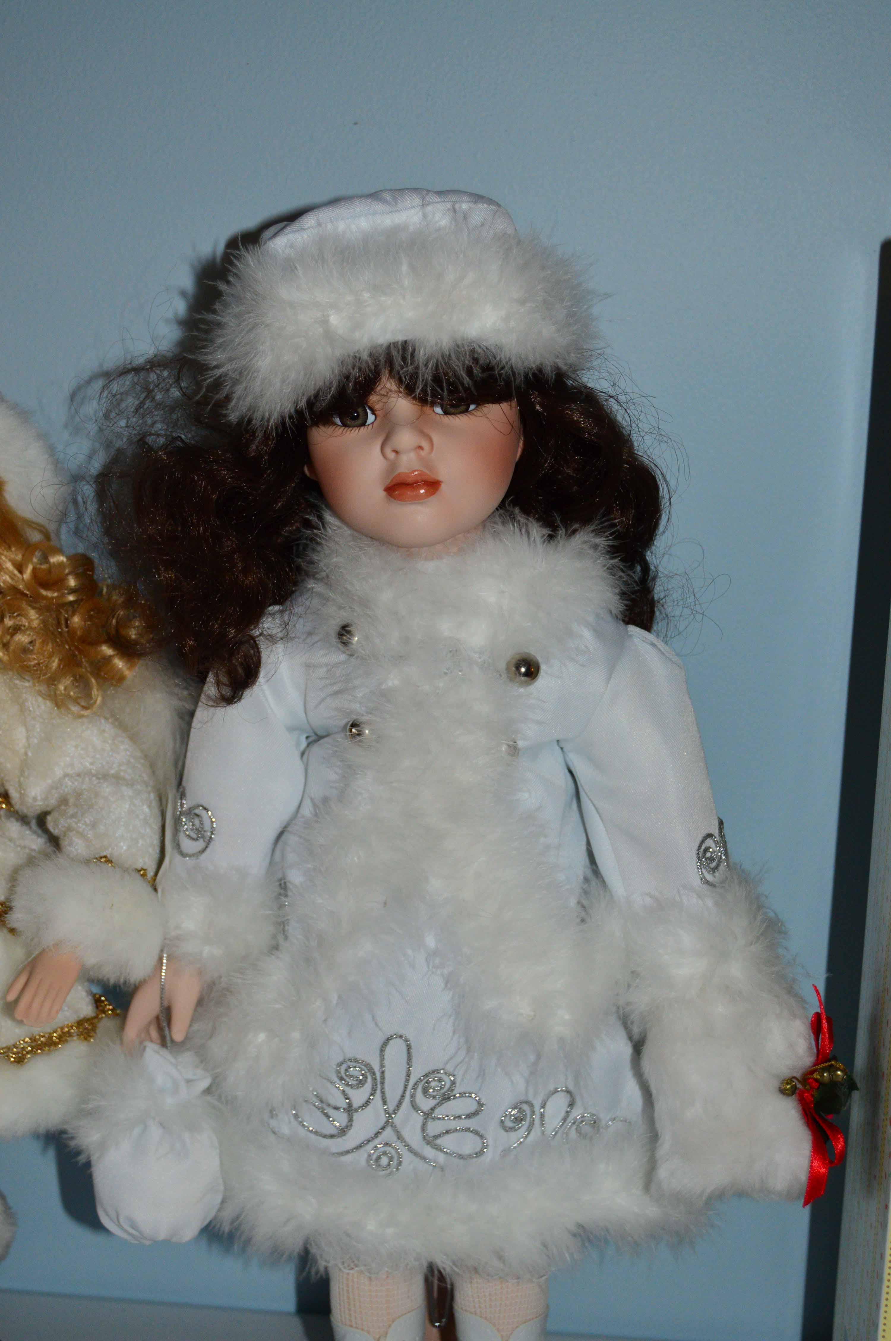 Collection of Winter Themed Porcelain Dolls