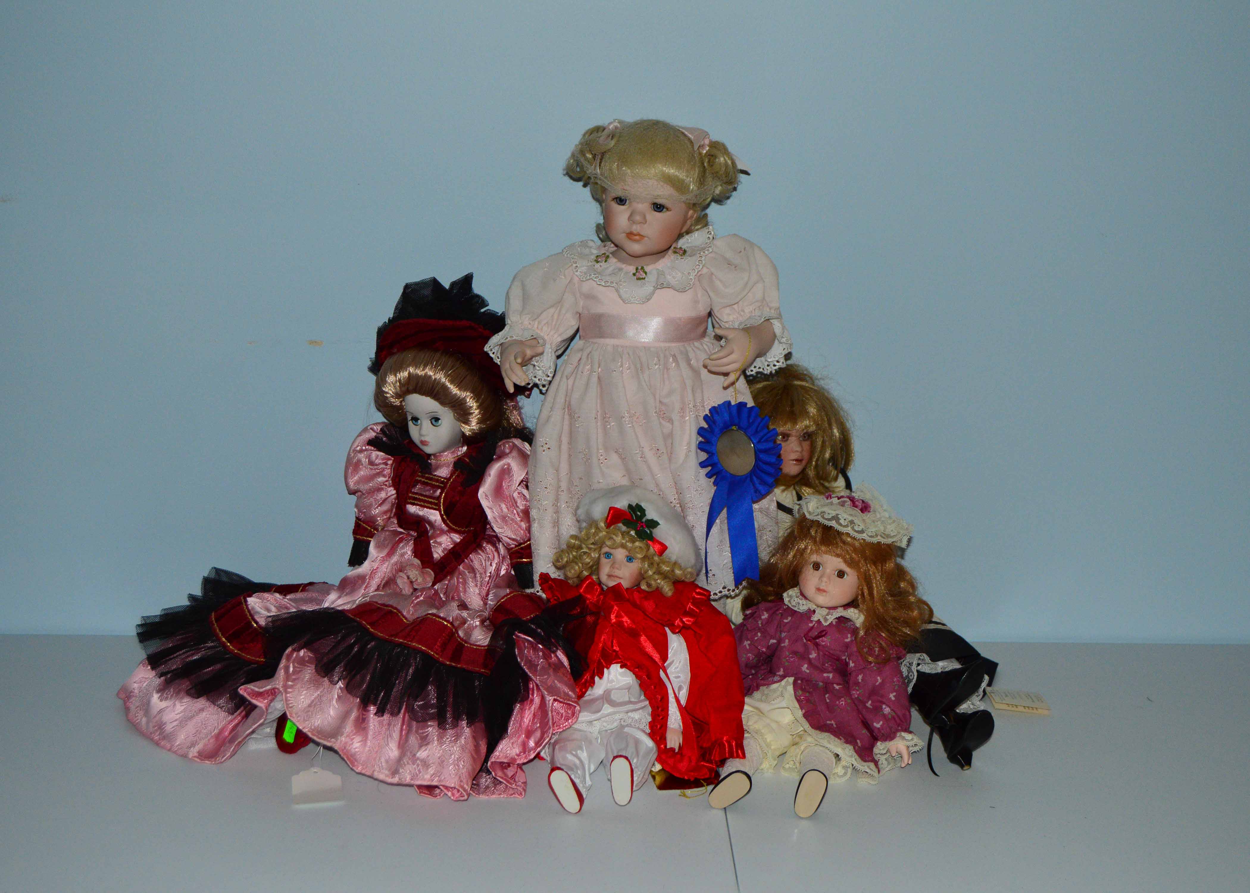 Assortment of Porcelain Dolls