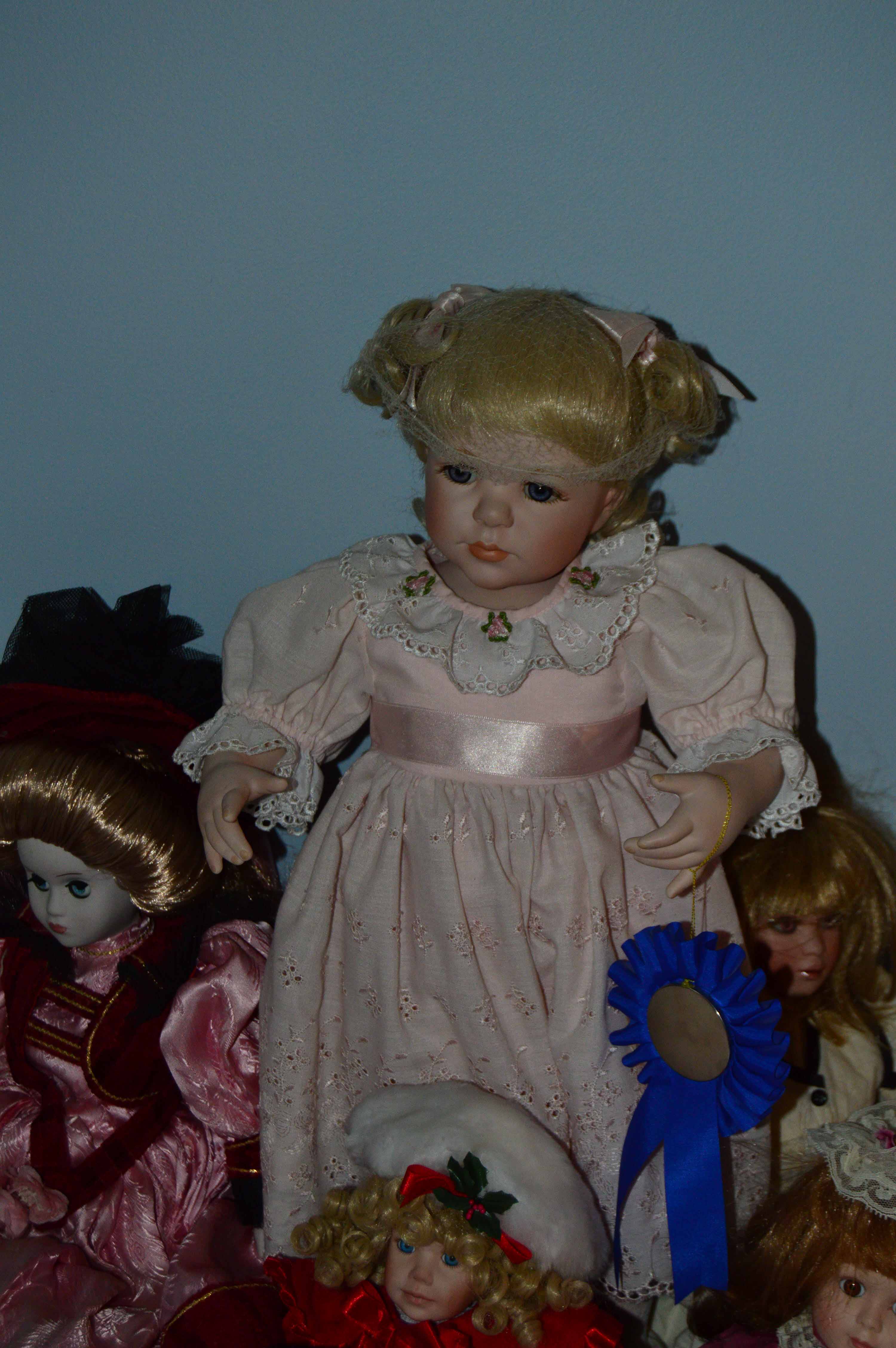 Assortment of Porcelain Dolls