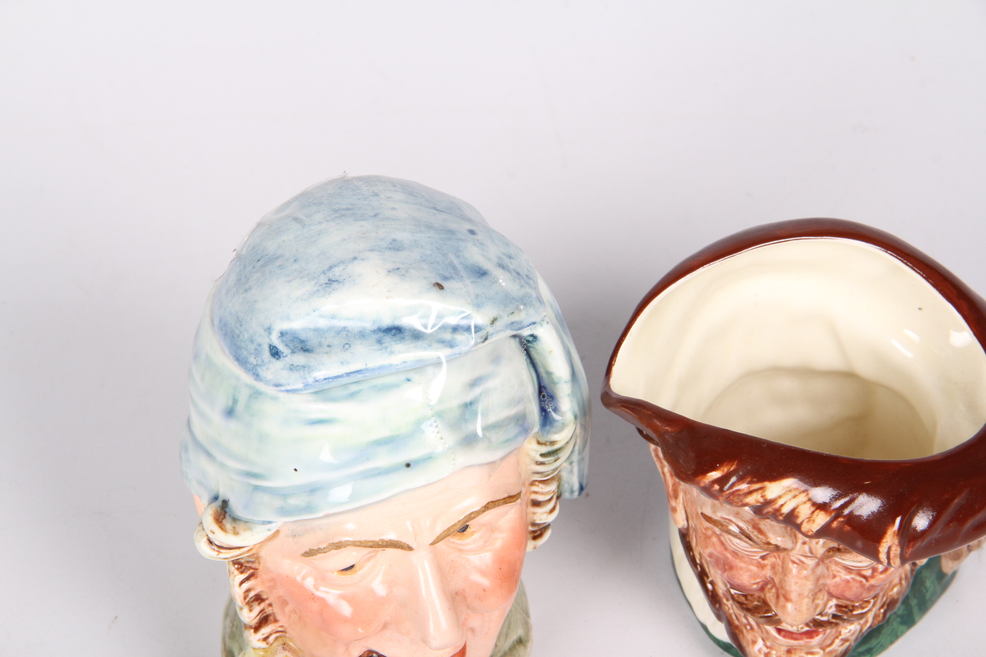 Pair of Character Jugs