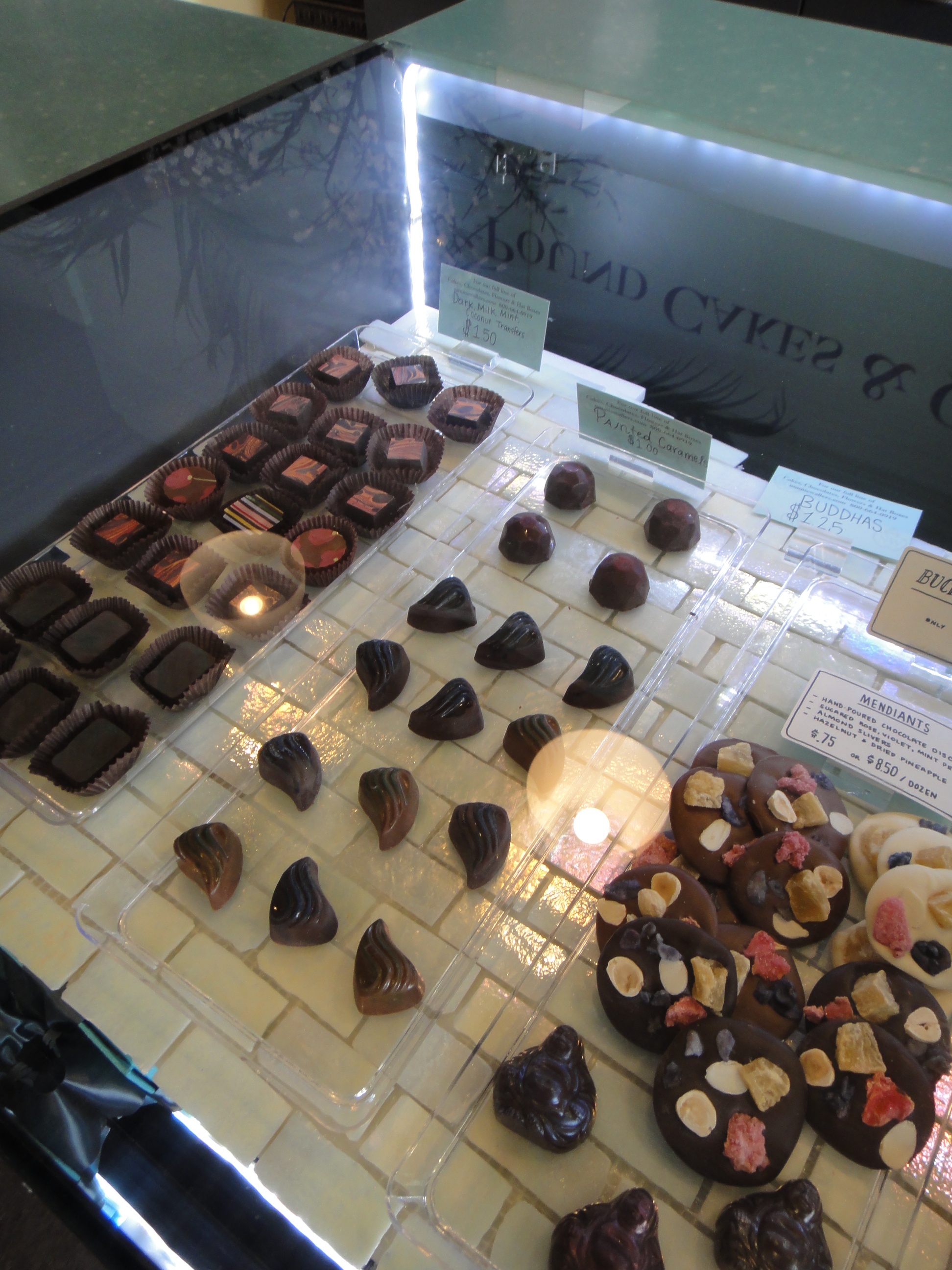 Custom Lighted Showcase by Thomas Cabinets Corian Ledge