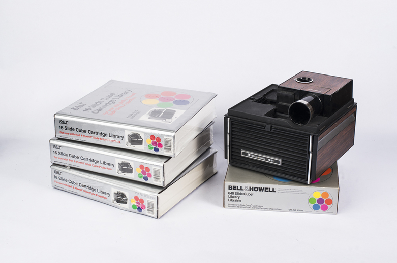 Bell and Howell Slide Projector with Slide Accessroies