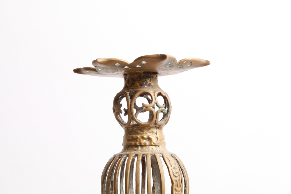 Decorative Household Assortment  Including an Antique Candlestick