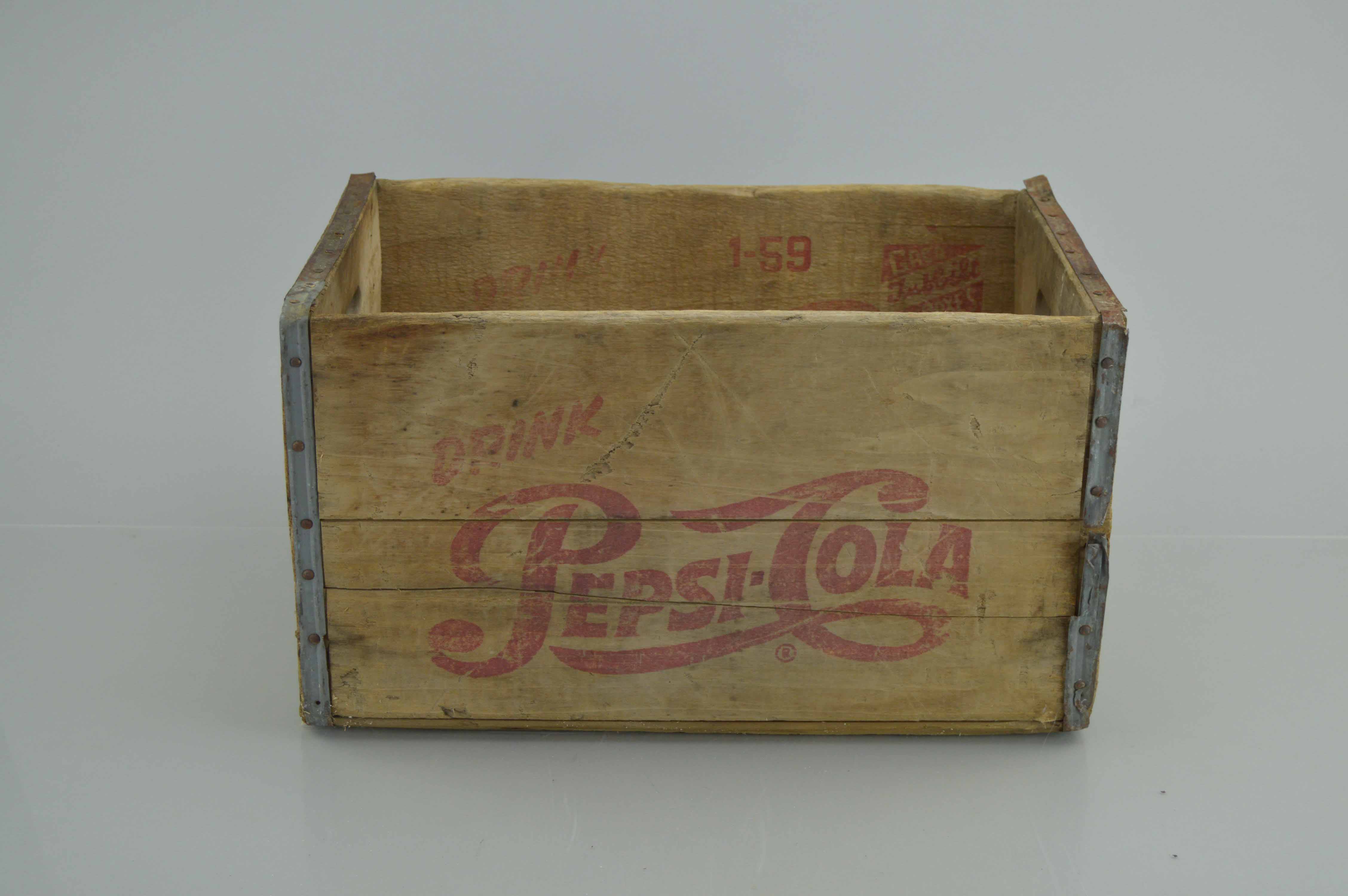 Assortment Of Vintage Wooden Crates With Advertisements