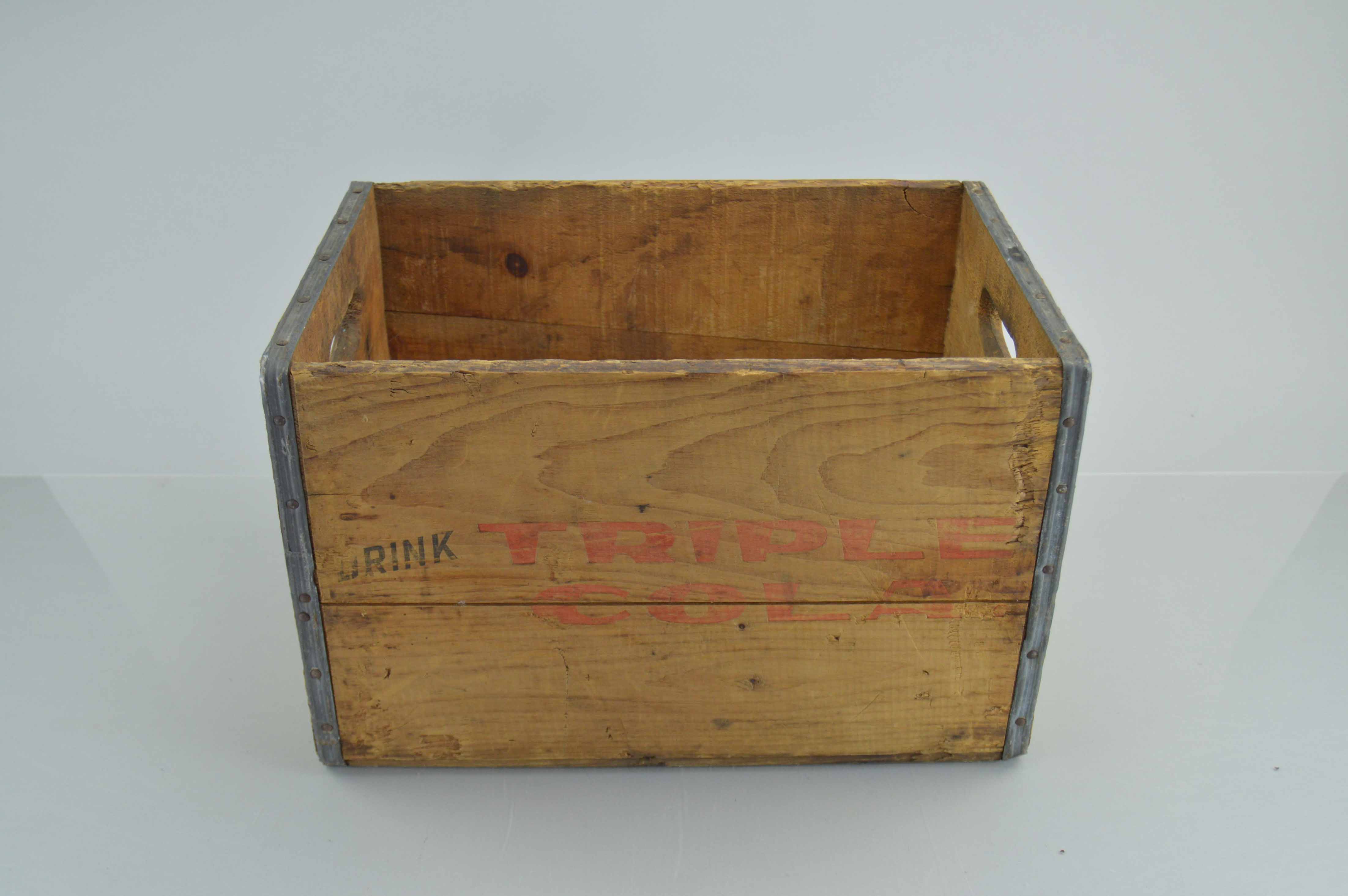 Assortment Of Vintage Wooden Crates With Advertisements