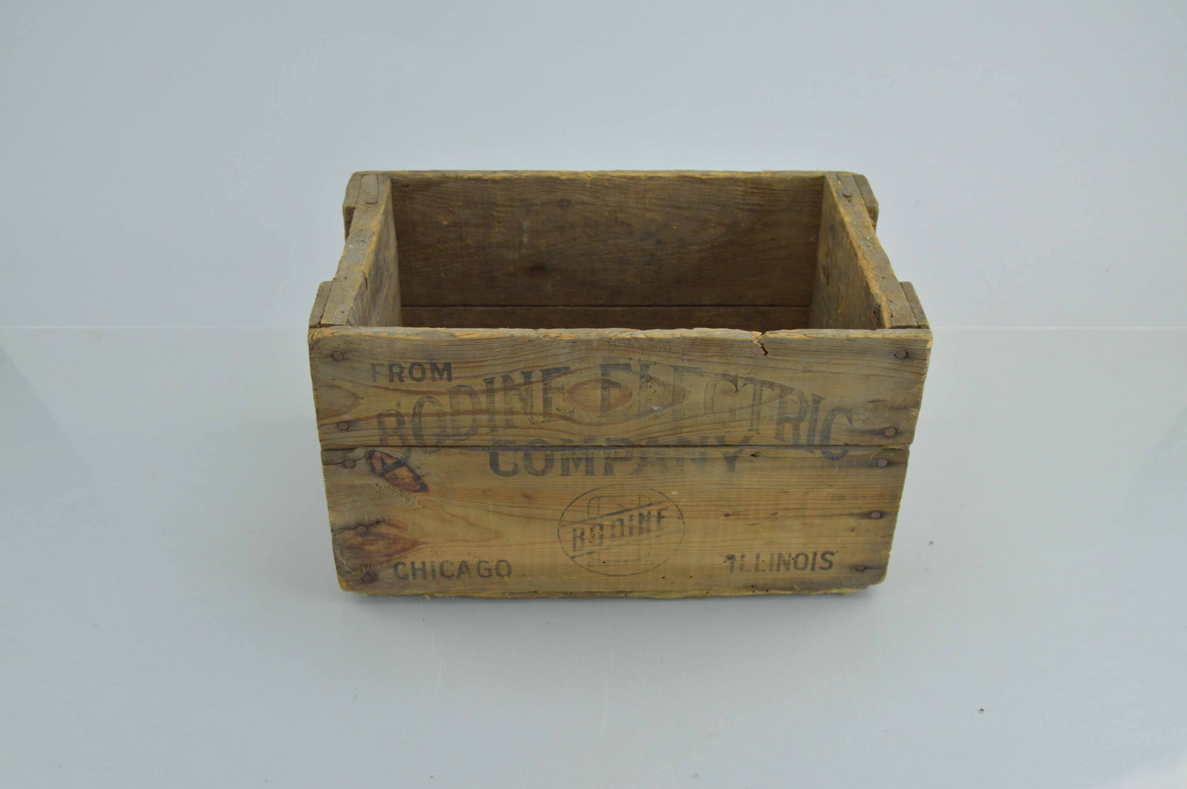Assortment Of Vintage Wooden Crates With Advertisements