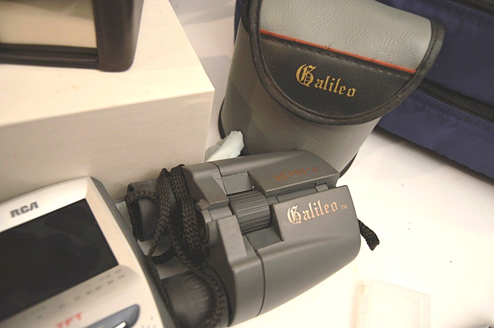 Sharper Image Computer Bag, Sony Cyper-Shot Camera, RCA Mini TV