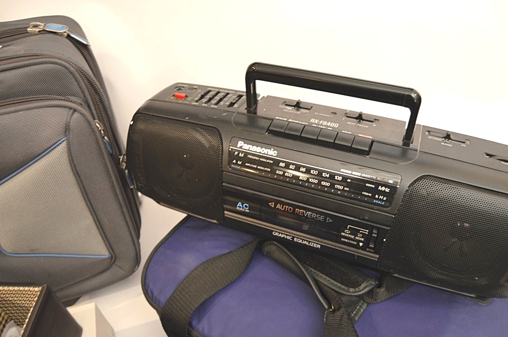 Sharper Image Computer Bag, Sony Cyper-Shot Camera, RCA Mini TV