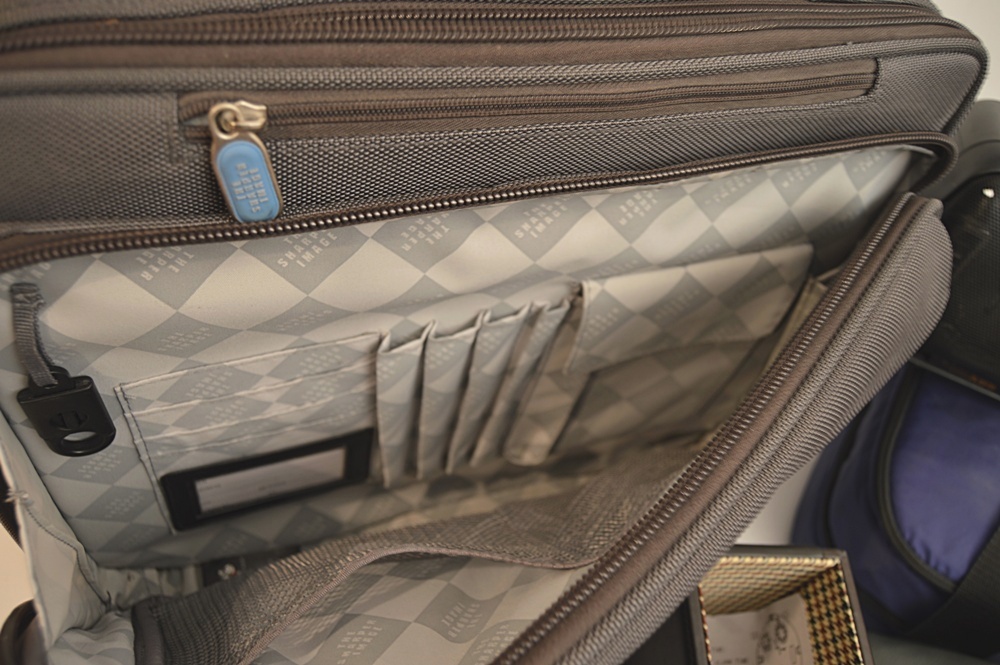 Sharper Image Computer Bag, Sony Cyper-Shot Camera, RCA Mini TV