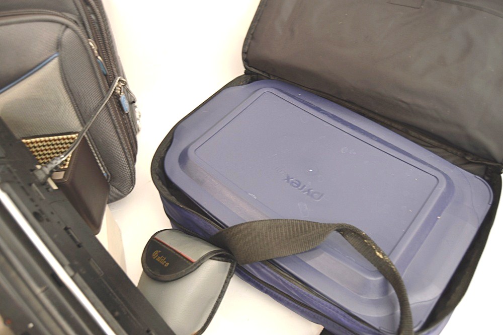 Sharper Image Computer Bag, Sony Cyper-Shot Camera, RCA Mini TV
