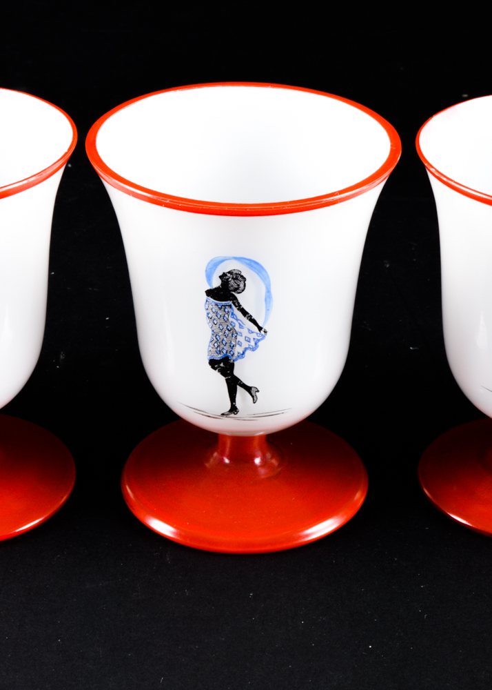 Five Red and White Footed Glass Cups Featuring Ladies