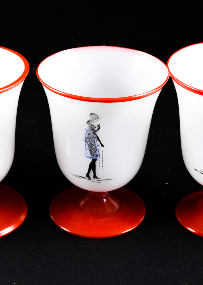 Five Red and White Footed Glass Cups Featuring Ladies