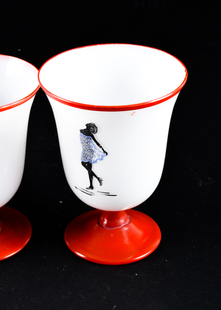 Five Red and White Footed Glass Cups Featuring Ladies