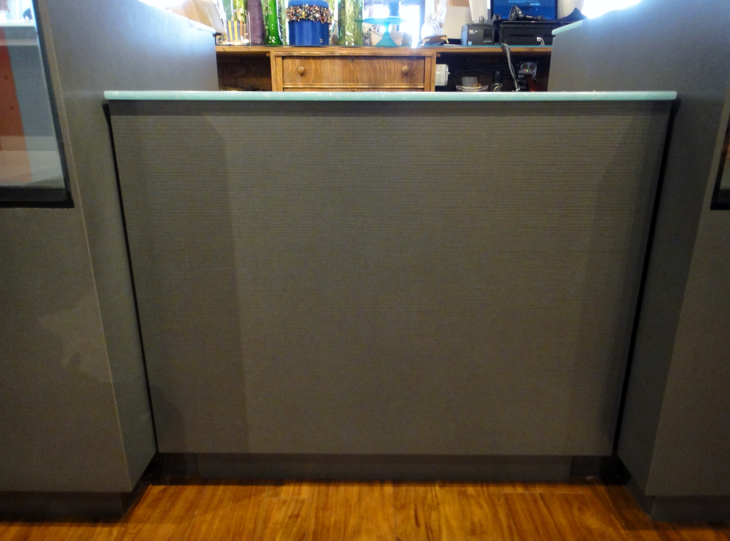 Custom Center Cabinet by Thomas Cabinet Shop Inc. Corian Top