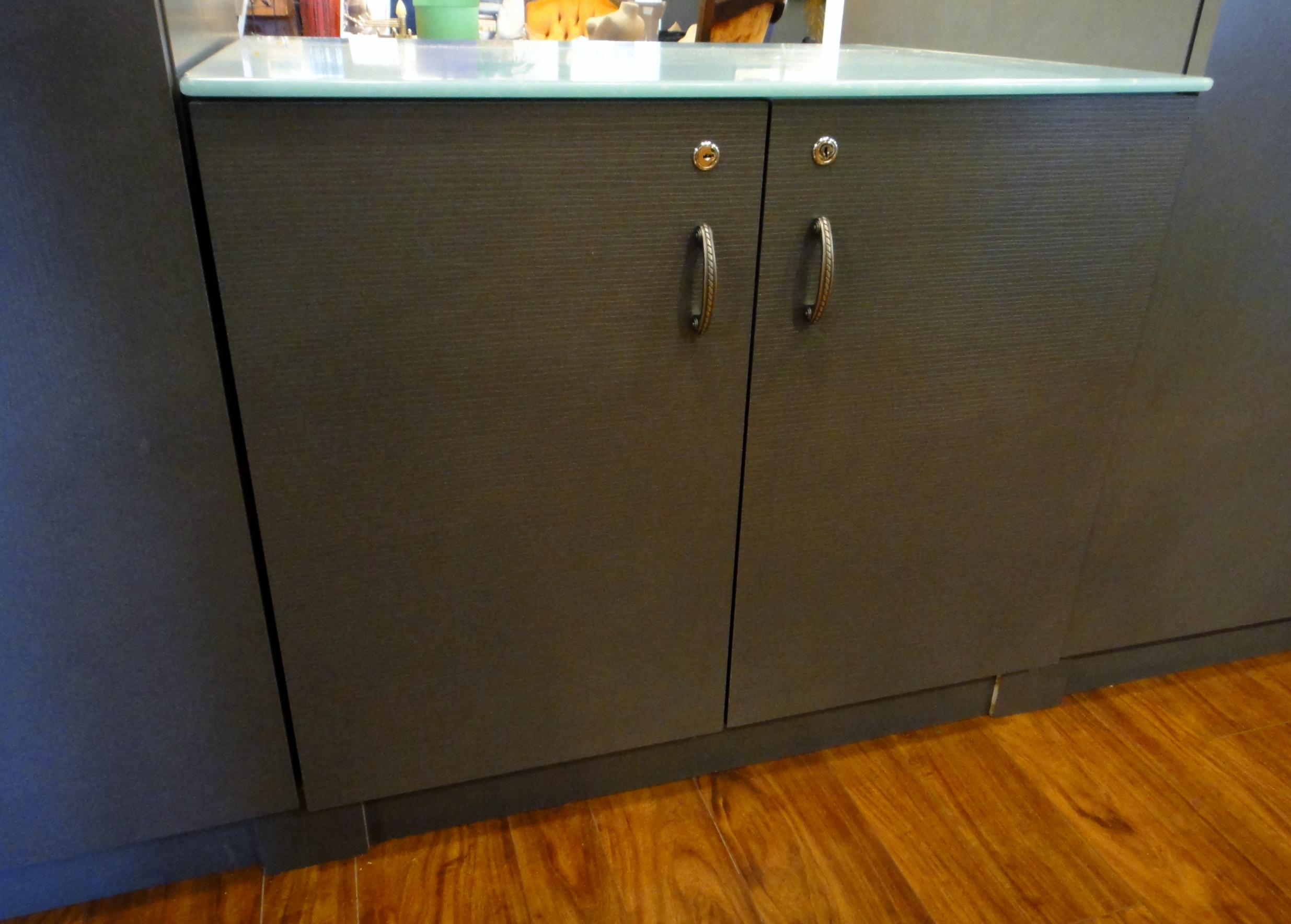 Custom Center Cabinet by Thomas Cabinet Shop Inc. Corian Top