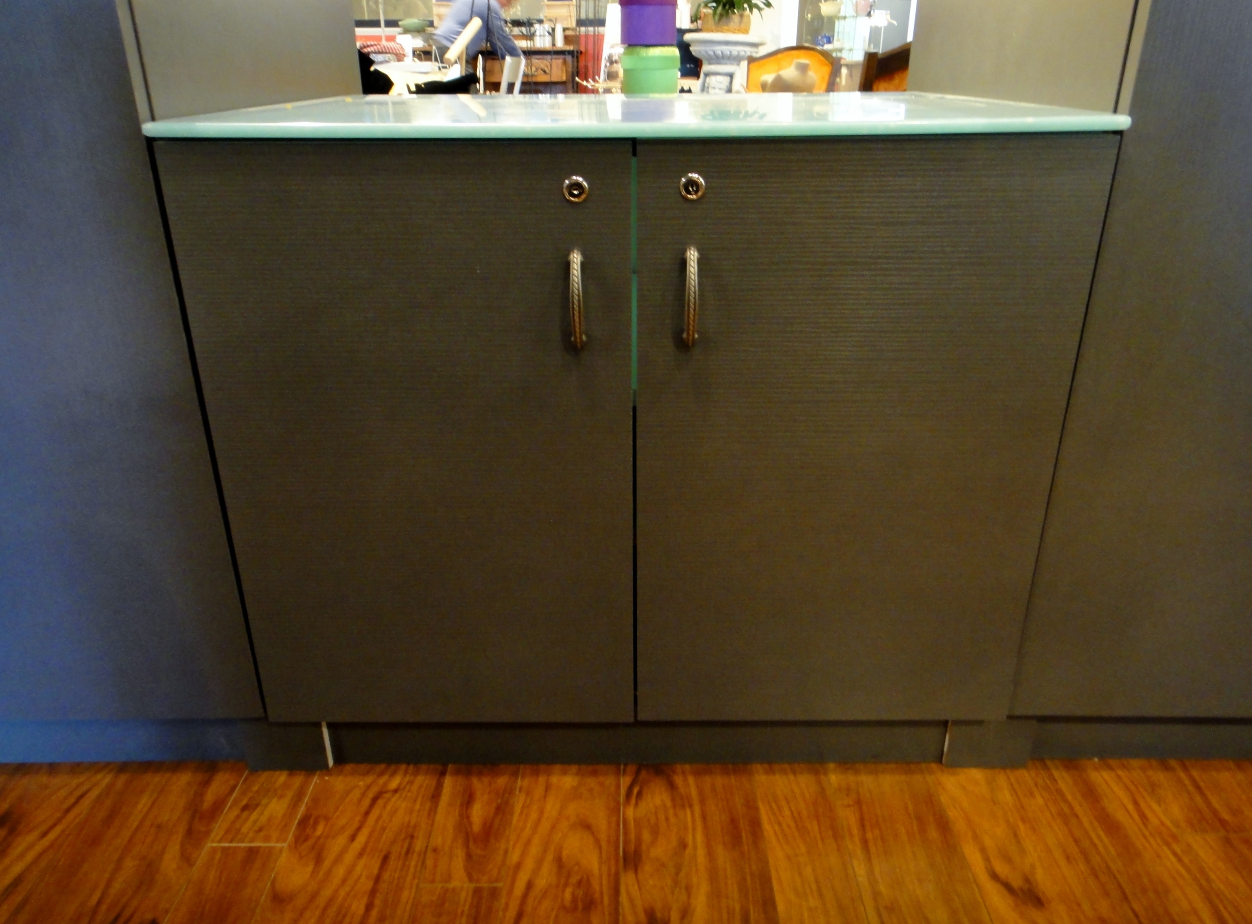 Custom Center Cabinet by Thomas Cabinet Shop Inc. Corian Top