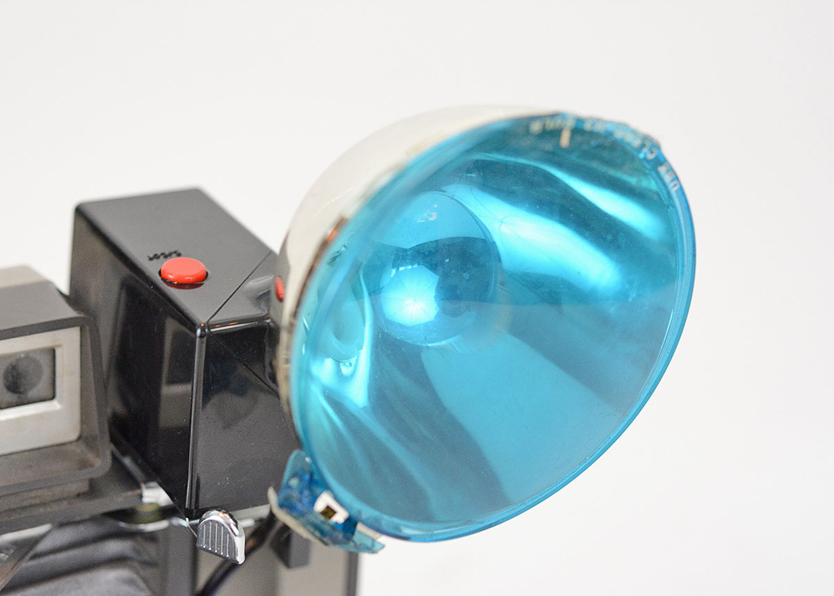 Trio of Polaroid Cameras with Flashgun