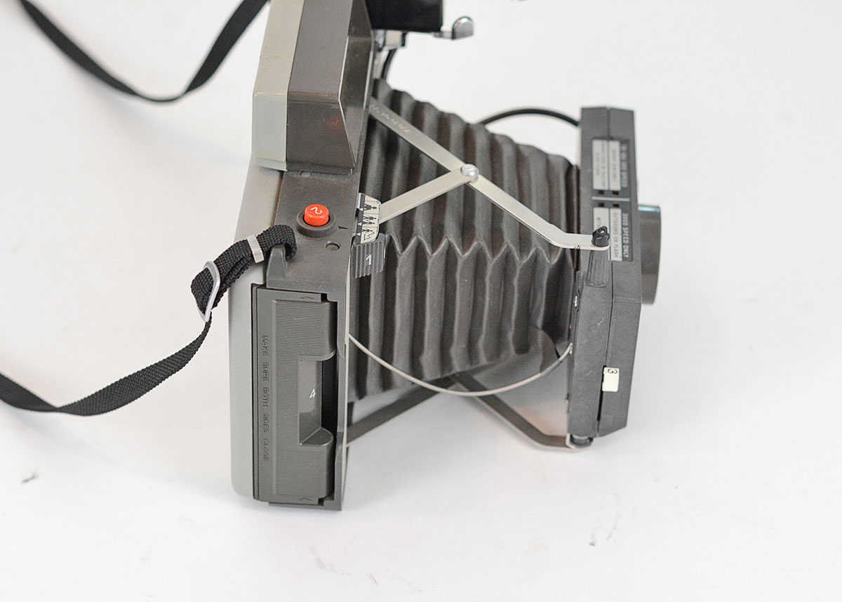 Trio of Polaroid Cameras with Flashgun