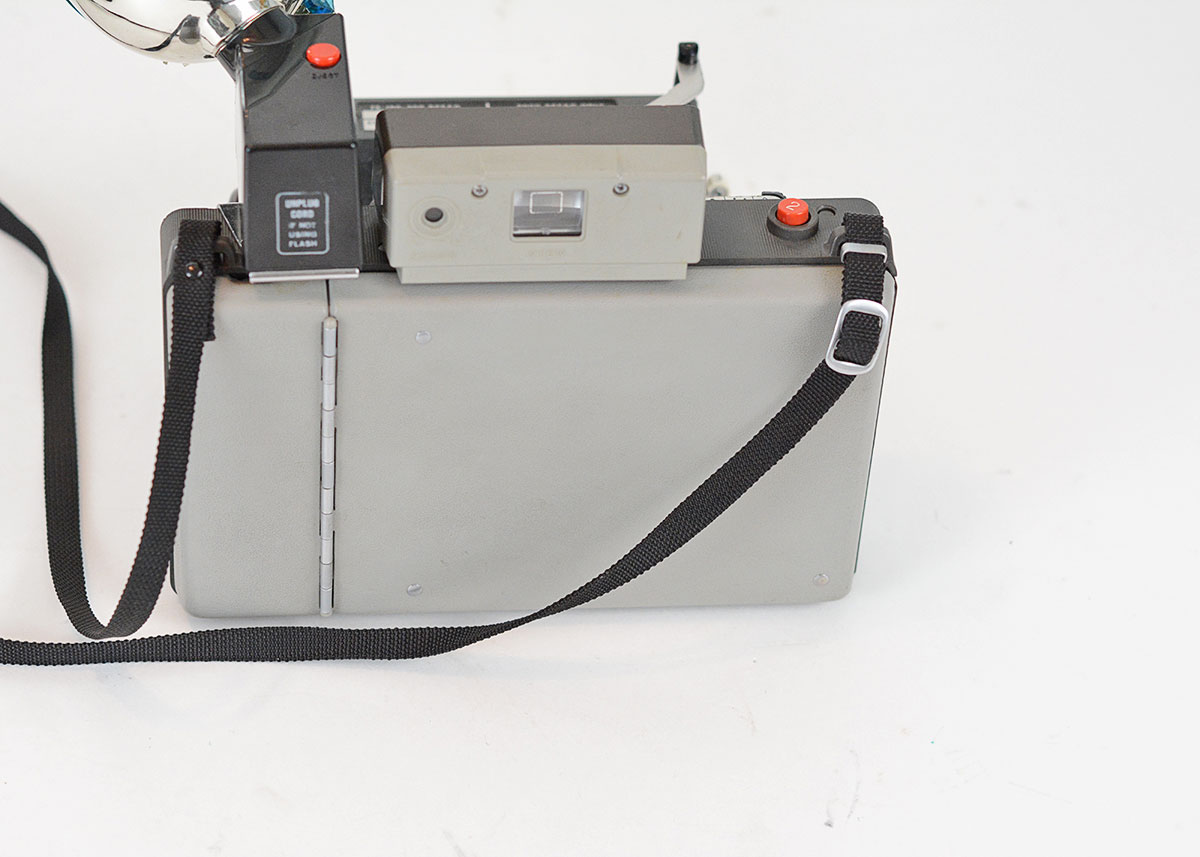 Trio of Polaroid Cameras with Flashgun