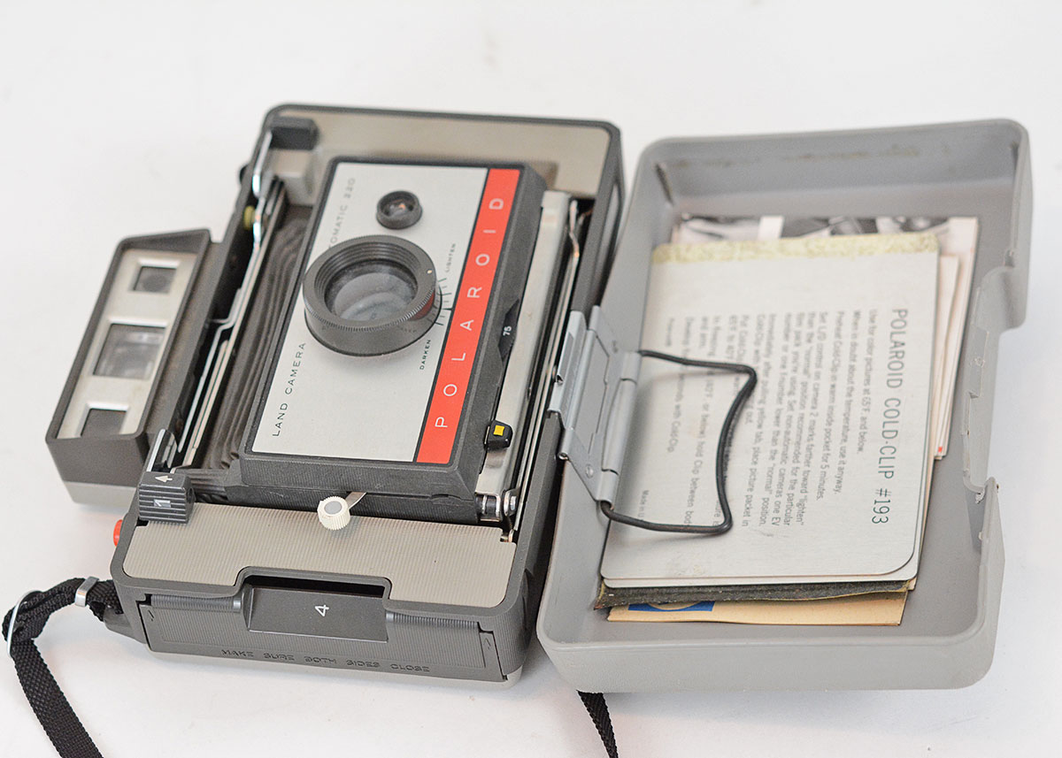 Trio of Polaroid Cameras with Flashgun