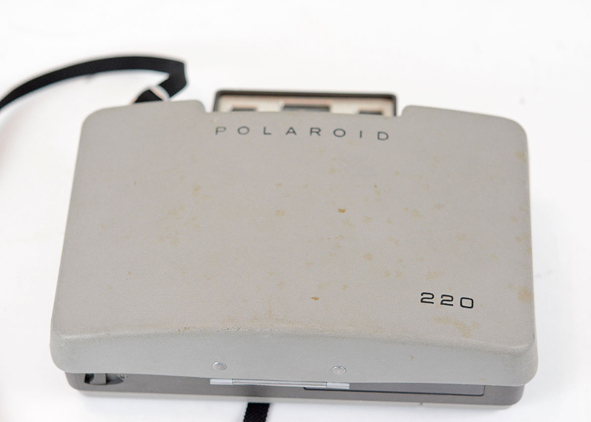 Trio of Polaroid Cameras with Flashgun