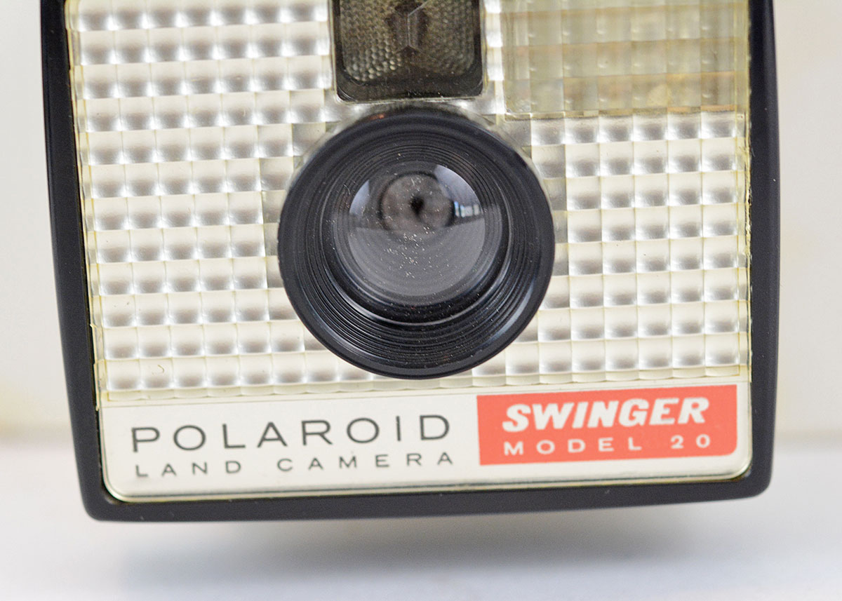 Trio of Polaroid Cameras with Flashgun