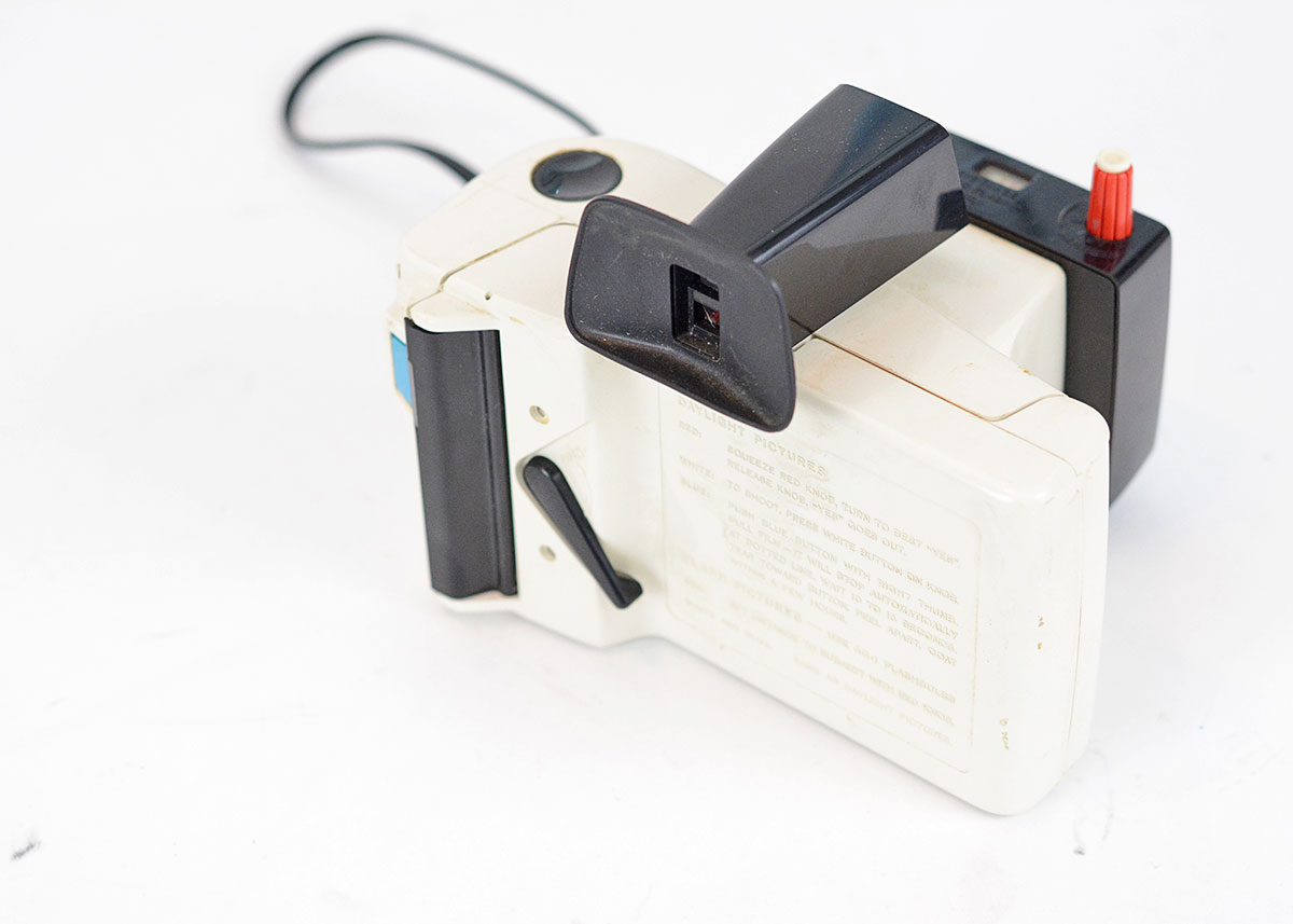 Trio of Polaroid Cameras with Flashgun