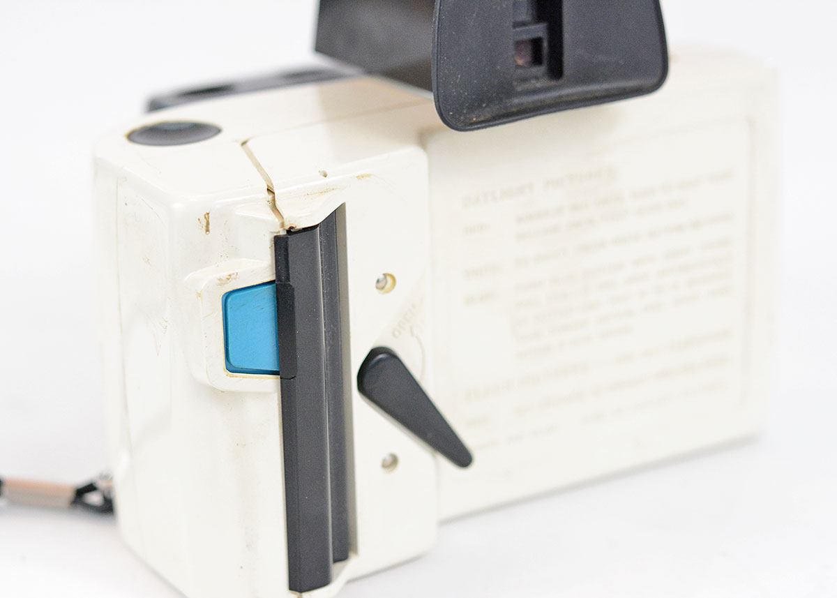 Trio of Polaroid Cameras with Flashgun
