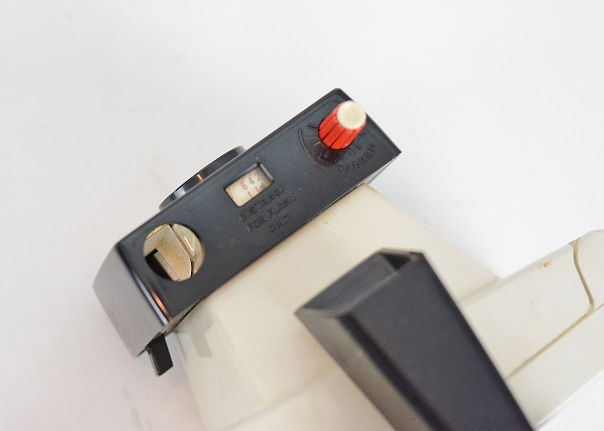 Trio of Polaroid Cameras with Flashgun